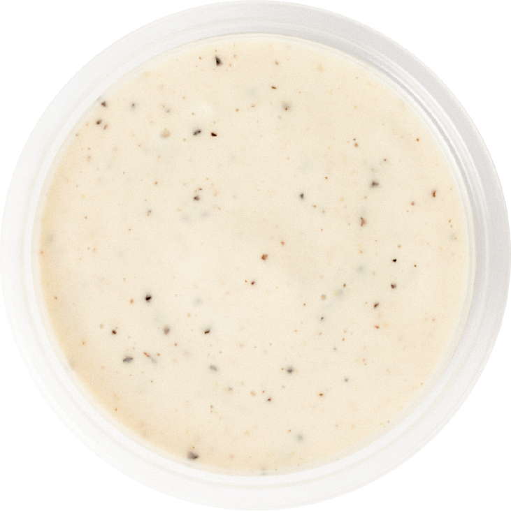 Ramekin of creamy garlic sauce