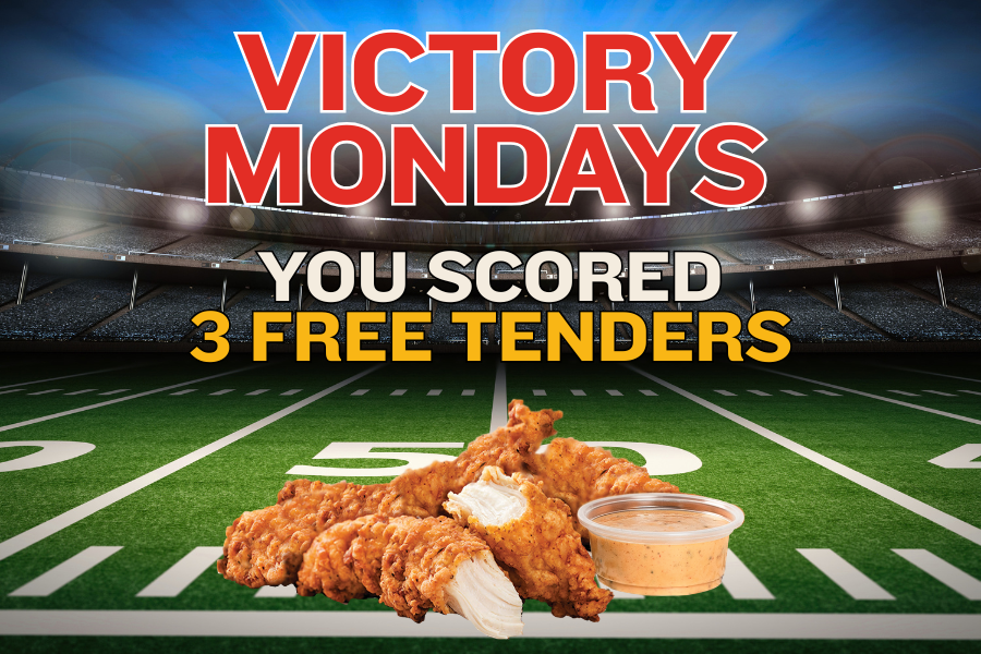 A sports stadium with bright lights and a football field, overlaid with text promoting victory Mondays and offering three free tenders with sauce.