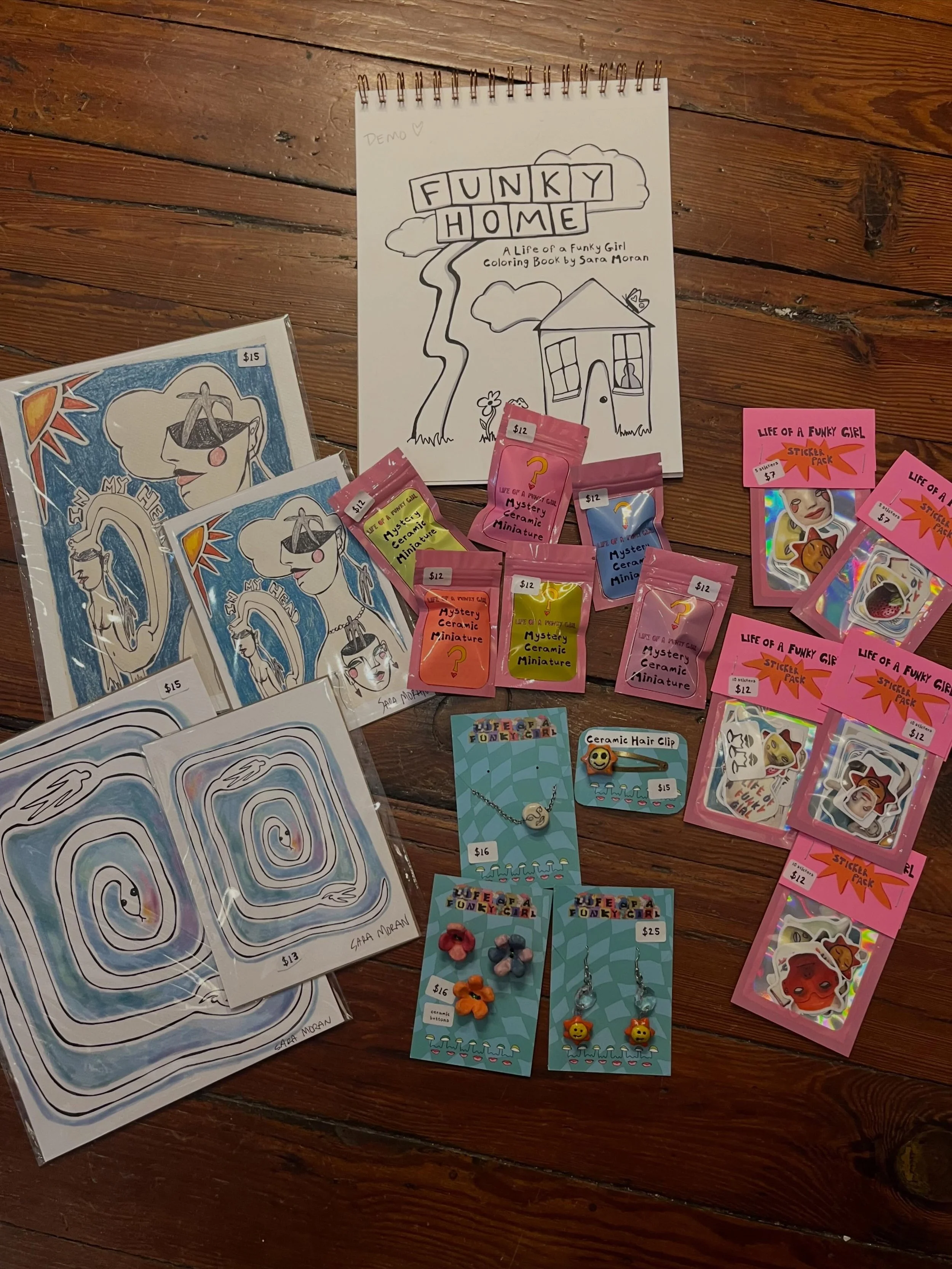 Some 🔥 restocks this week!

1. New @lifeofafunkygirl coloring books, prints, jewelry, sticker packs AND mini mystery ceramics!
2. One of our youth consigners Kandi by A keychains and bracelets
3. One of our new consigners @creationsby_destini beauti