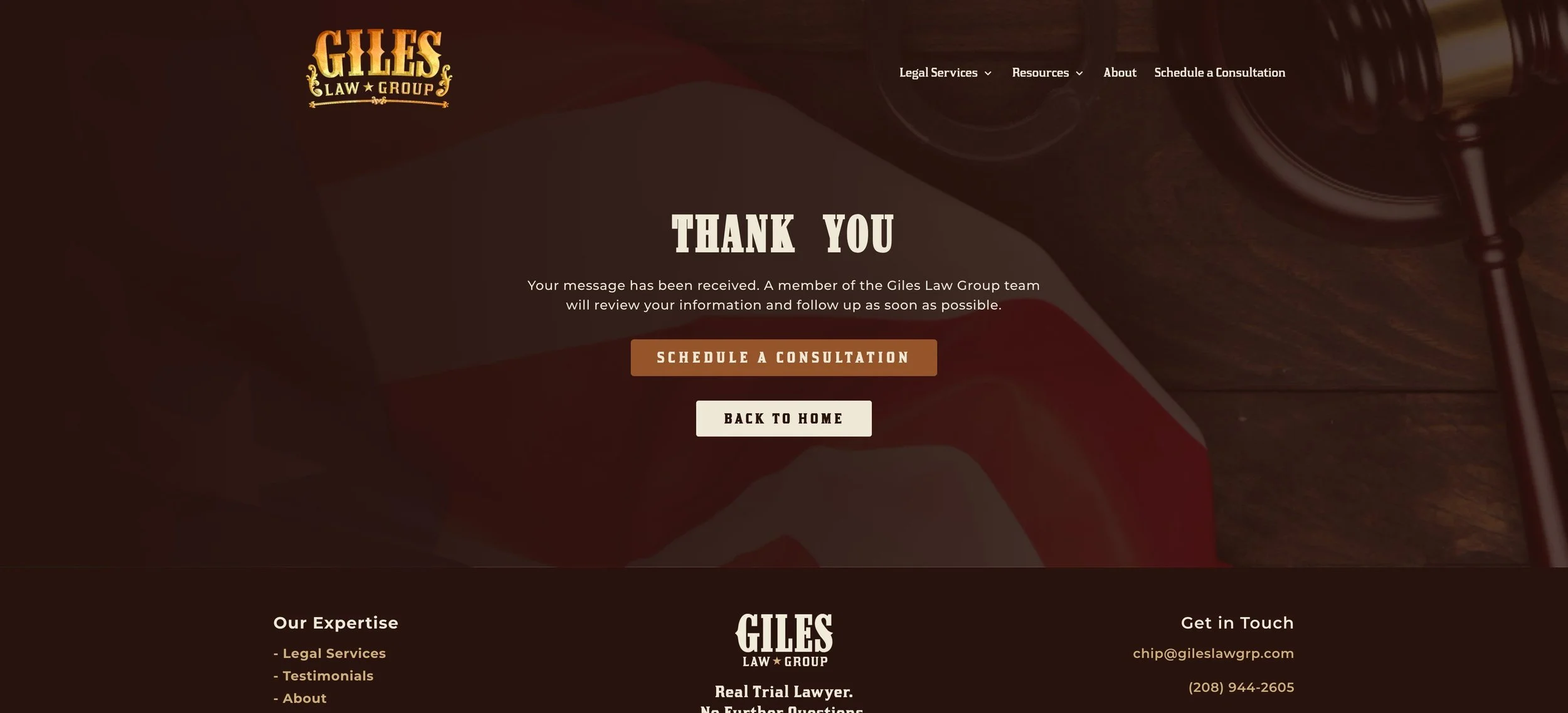 A website page for Giles Law Group featuring a welcome message, a gavel, and options for legal services, resources, about, schedule a consultation, and contact information.