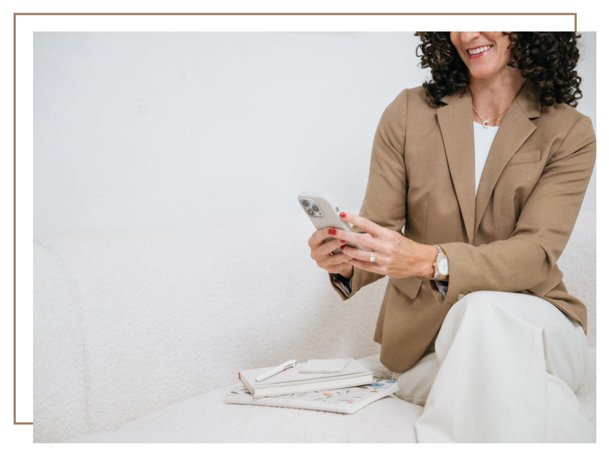 Courtney on her phone, responding to an accounting inquiry
