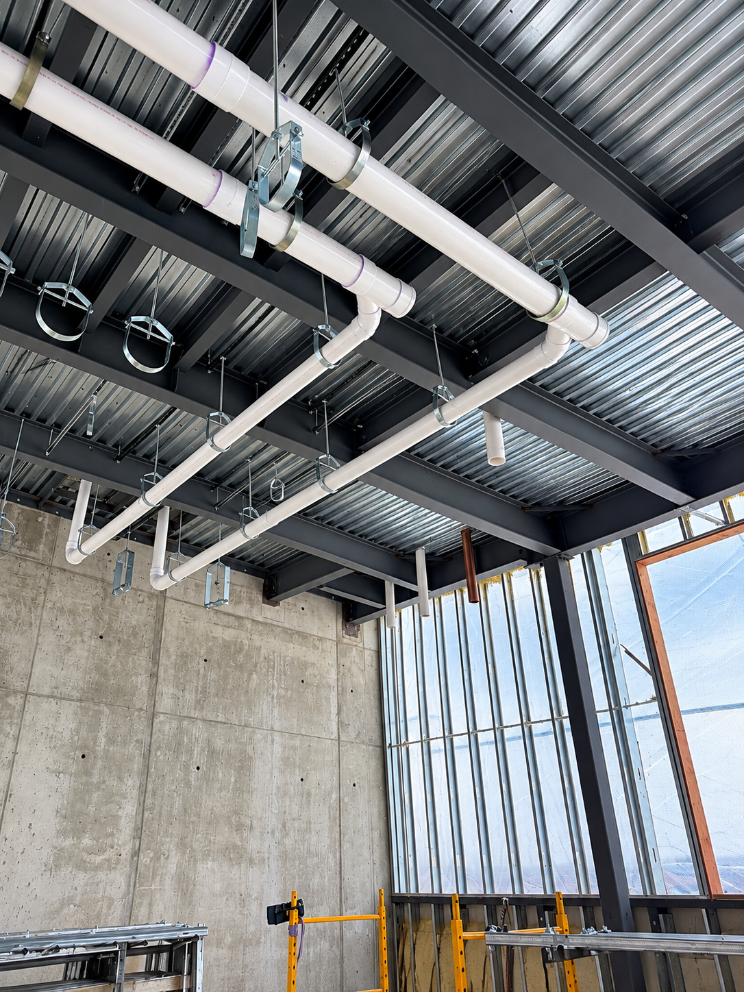 Overhead commercial plumbing piping installation