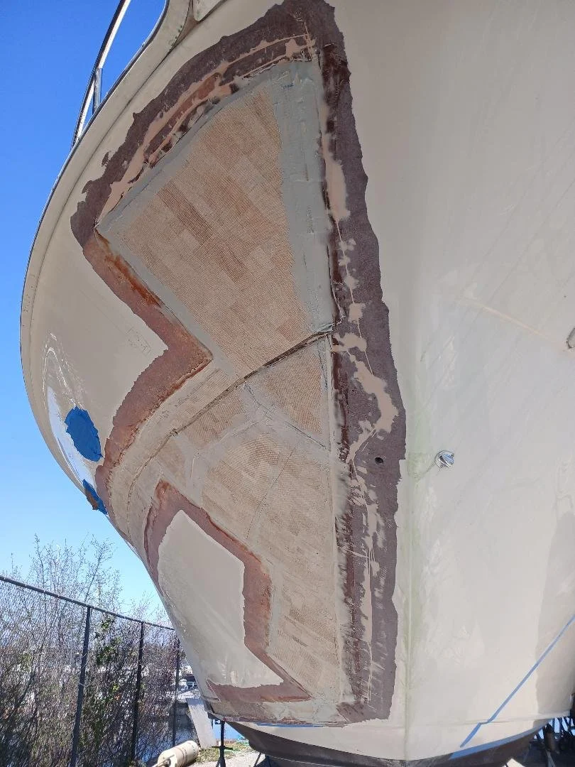 Fiberglass delamination on the forward bow, starboard side.