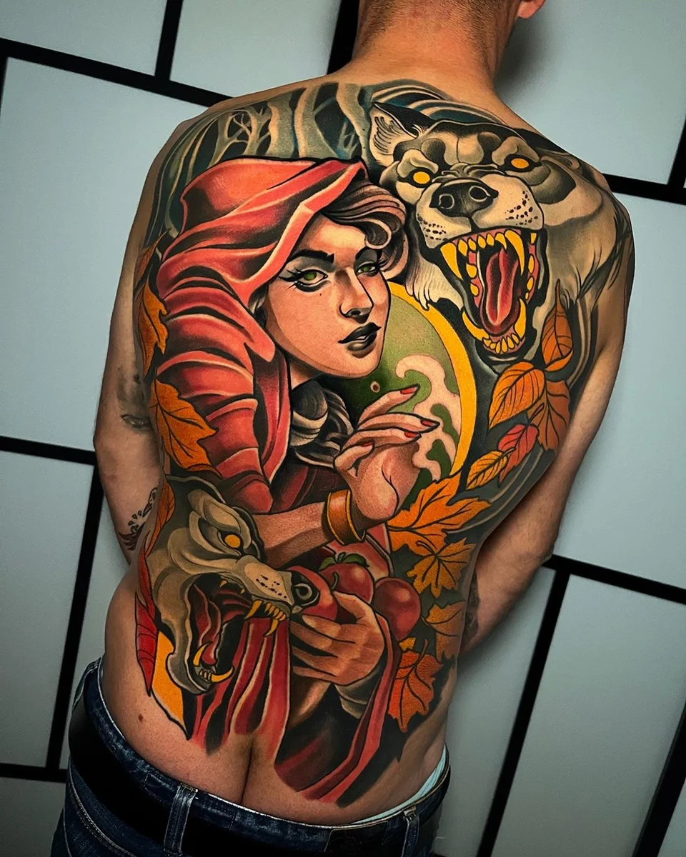 Colorful chest tattoo featuring a woman with red hair, holding an apple, surrounded by a wolf, a dragon, and autumn leaves. By Johnny Domus, Neo Traditional and Neo Japanese Tattoo.