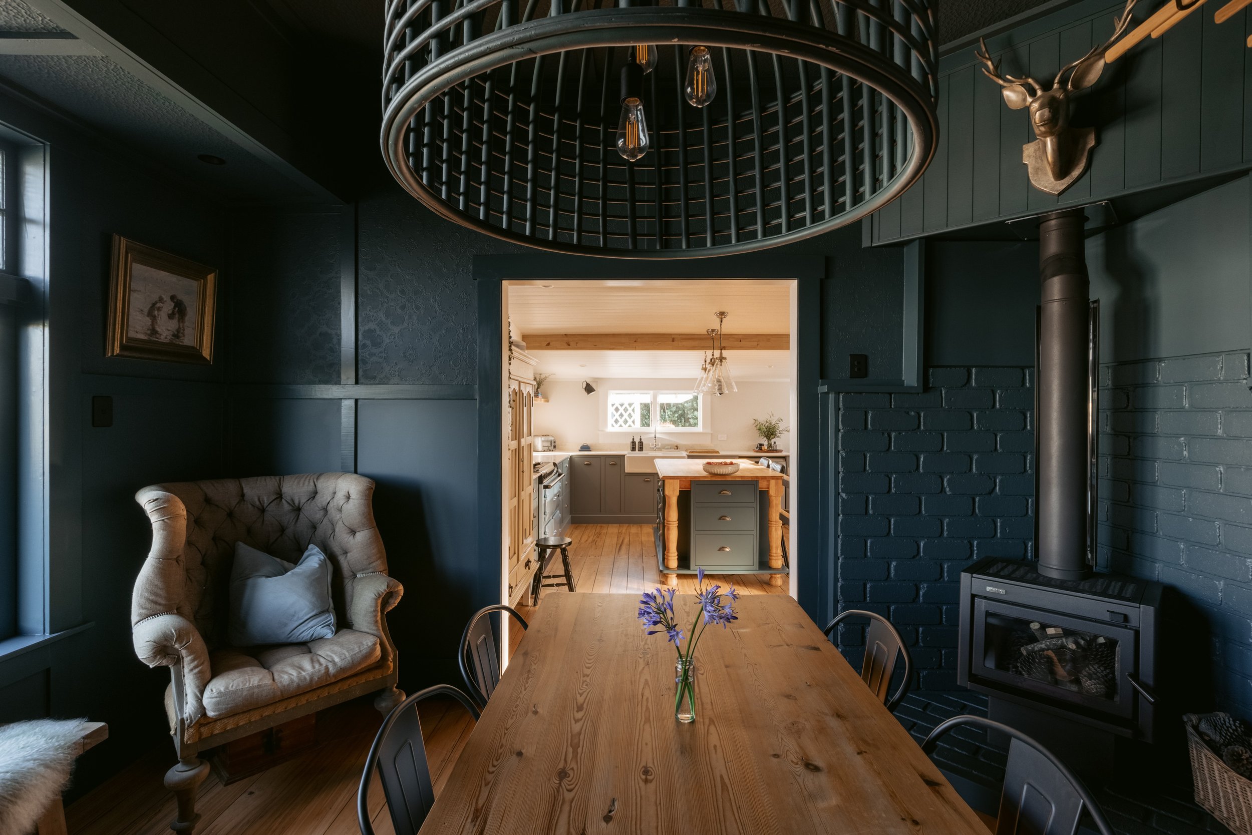 View of a dining room and kitchen area. Renovation of Kitchen and dining for a 1930's bungalow in Papamoa, New Zealand by BCN Studio