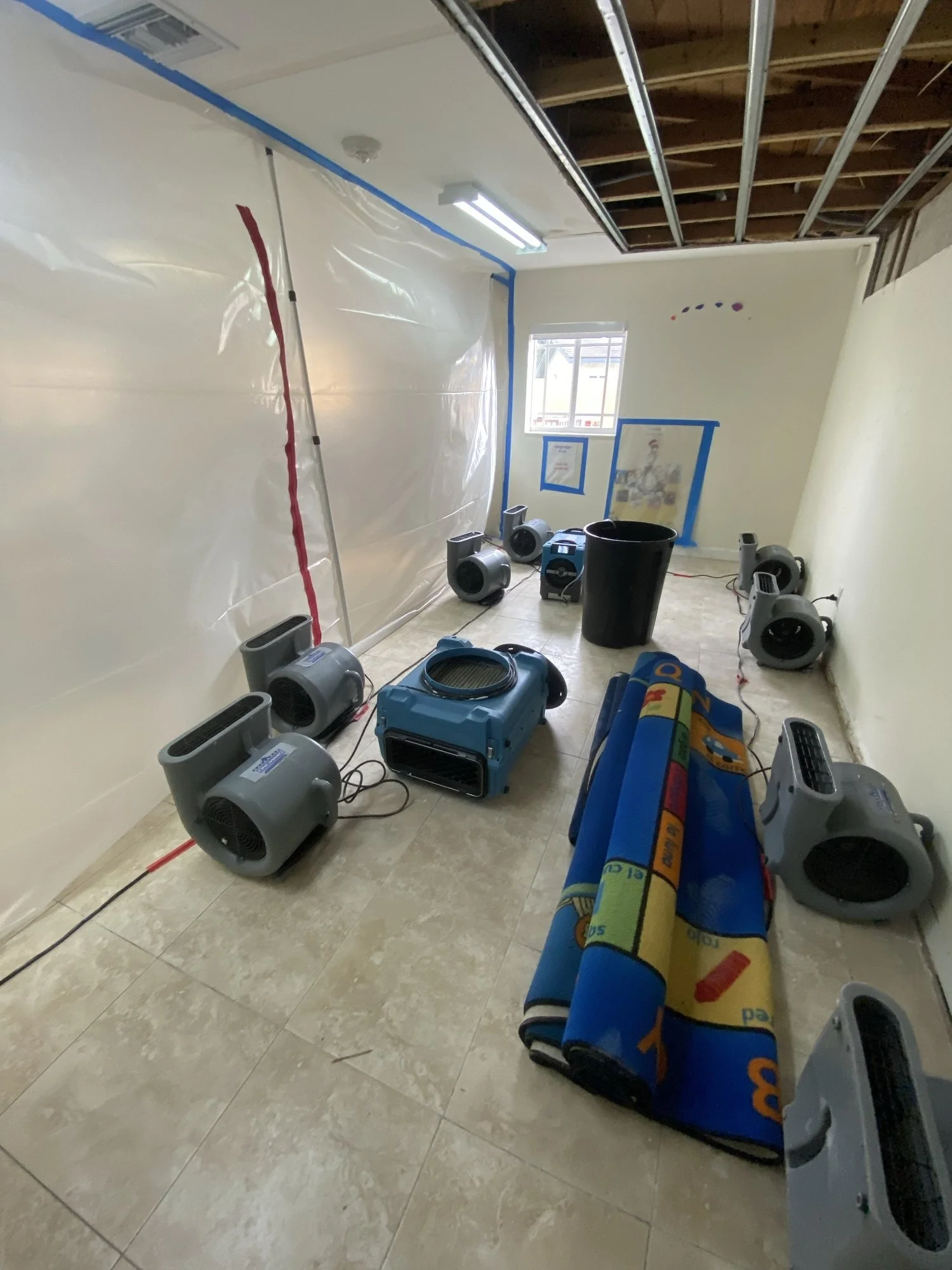 Plastic containment and drying equipment set up during mold remediation