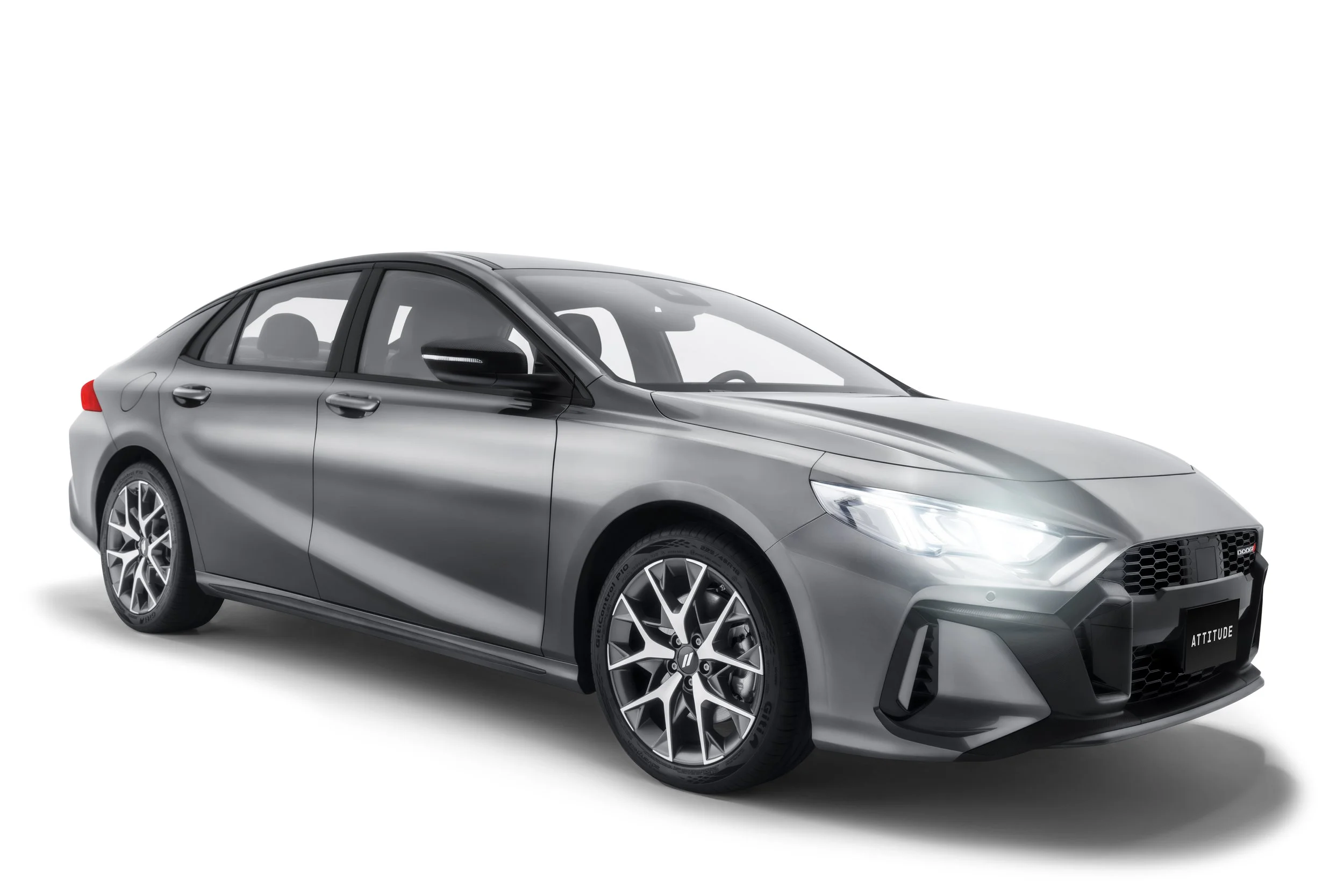 A sleek, silver, four-door modern sedan with alloy wheels, black trim, and a sporty design.