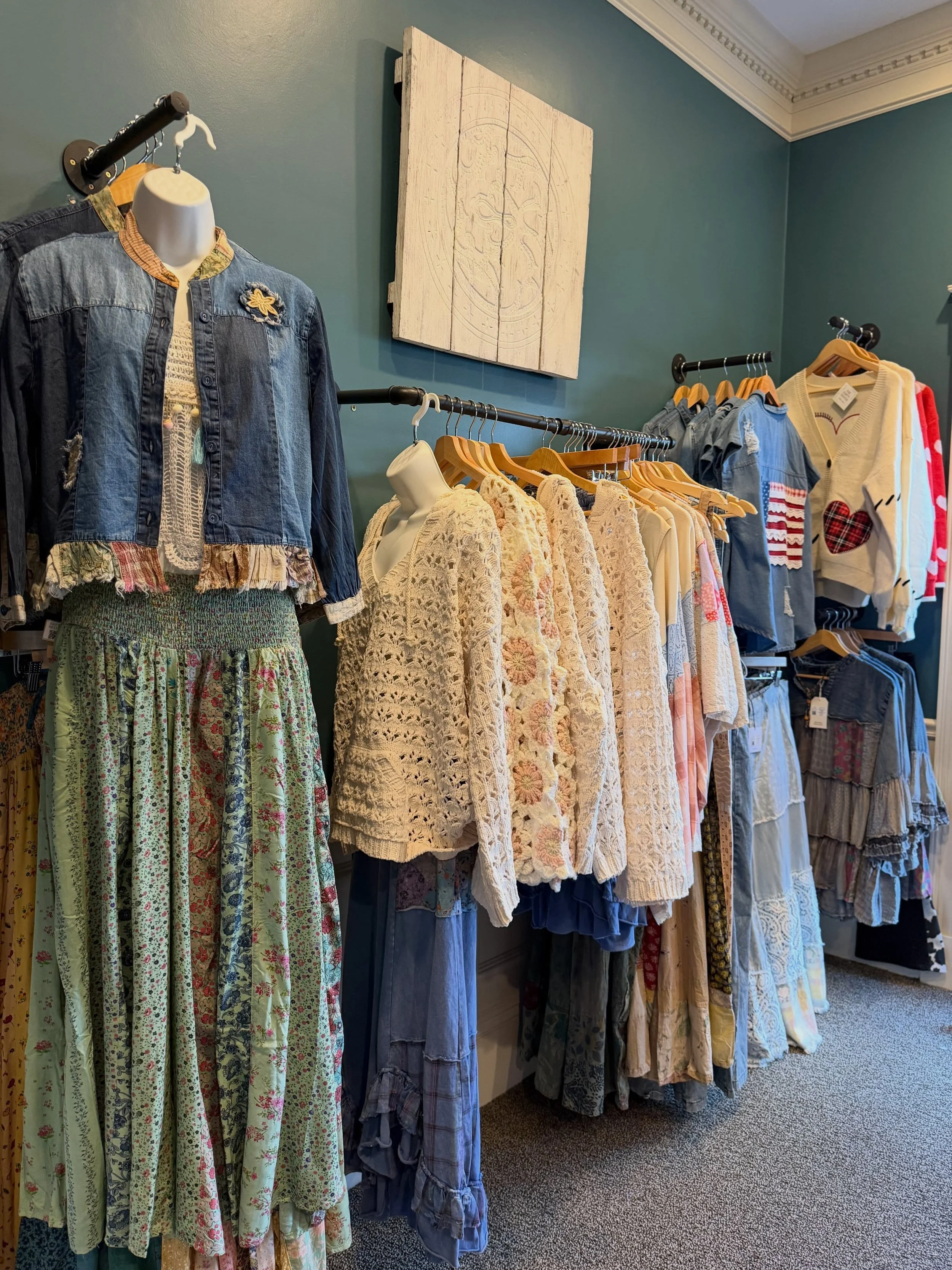 When you walk into The Downtown Market House, you are instantly greeted by The Empty Nester. Debbie&rsquo;s room is warm and welcoming, inviting you to browse her many items. From @myrabag handbags, keychains, travel cups, to candles and warmers. She