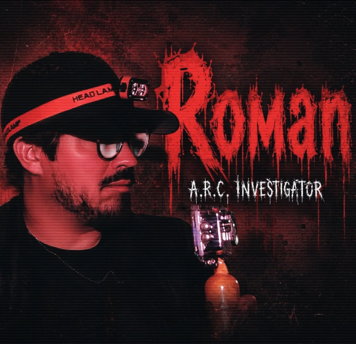 Man wearing a black cap with red band and glasses, holding an infrared flashlight for ghost investigations in front of a red graffiti wall with the word 'ROMAN' and other text reading 'A.R.C. Investigator'.