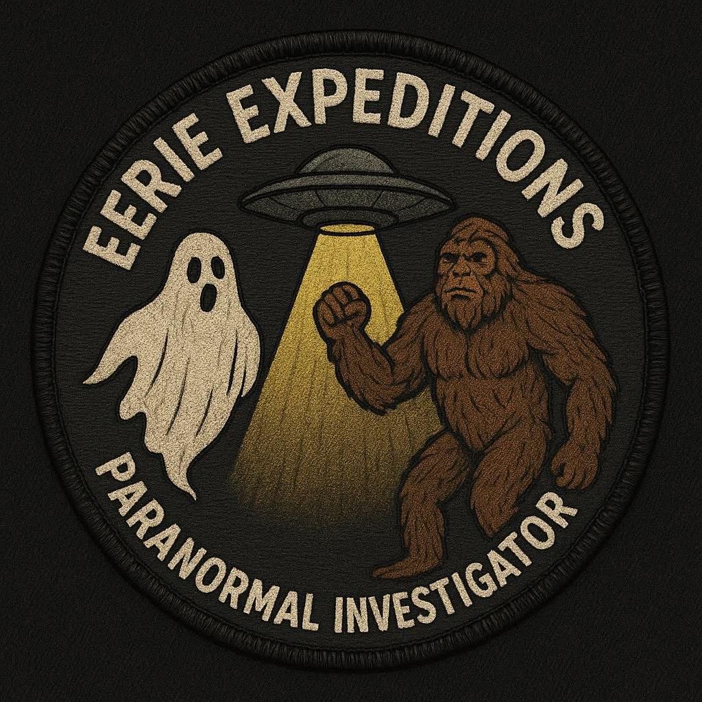 A circular patch with the text "Eerie Expeditions Paranormal Investigator". The patch features a ghostly figure on the left, a flying saucer beaming light in the center, and a bigfoot creature on the right.