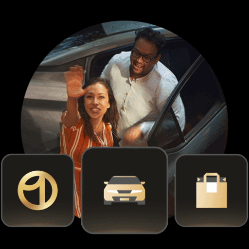A woman and man waving goodbye from a car window.