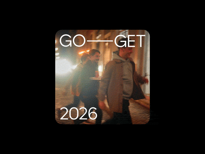 People walking in a street at night with the text 'GO GET 2026' overlayed.