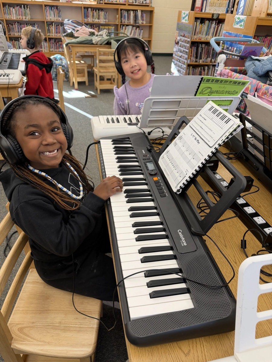 Students enjoying keyboard practice at Dynamic Music Studio