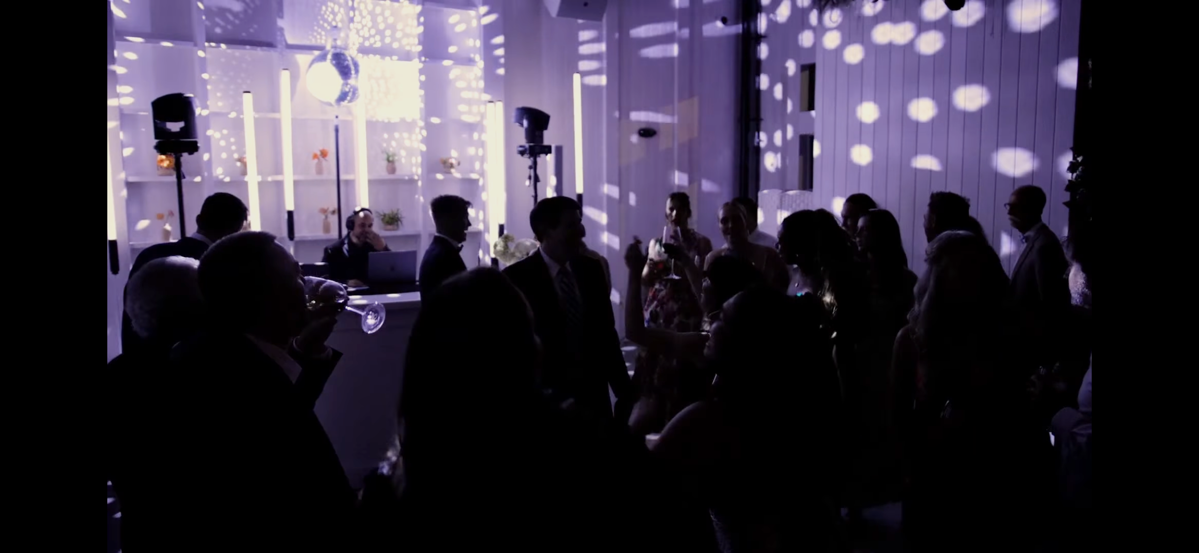 Luxury wedding DJ reception by Versamix Music in Savannah Georgia featuring professional lighting and packed dance floor