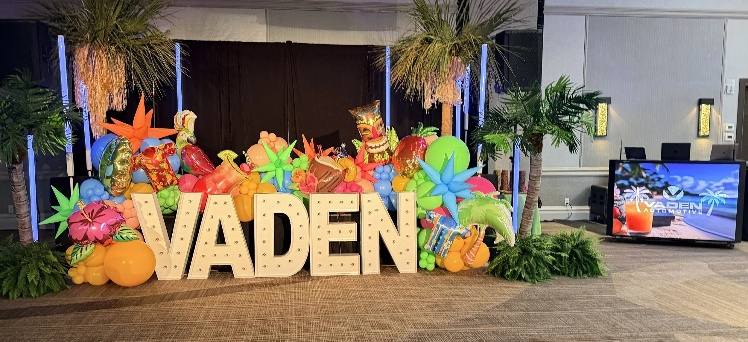 Corporate event entertainment by Versamix Music featuring custom LED DJ booth and intelligent lighting in Savannah Georgia