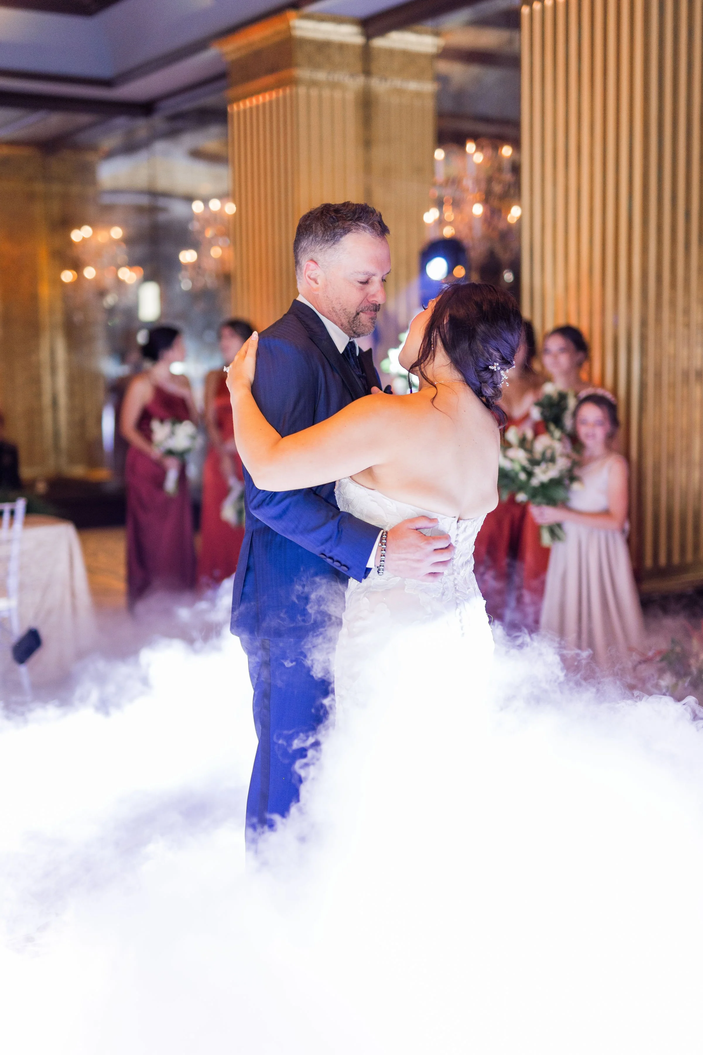 Bride and groom sharing their first dance with Dancing on the Cloud effect at a Savannah Georgia wedding