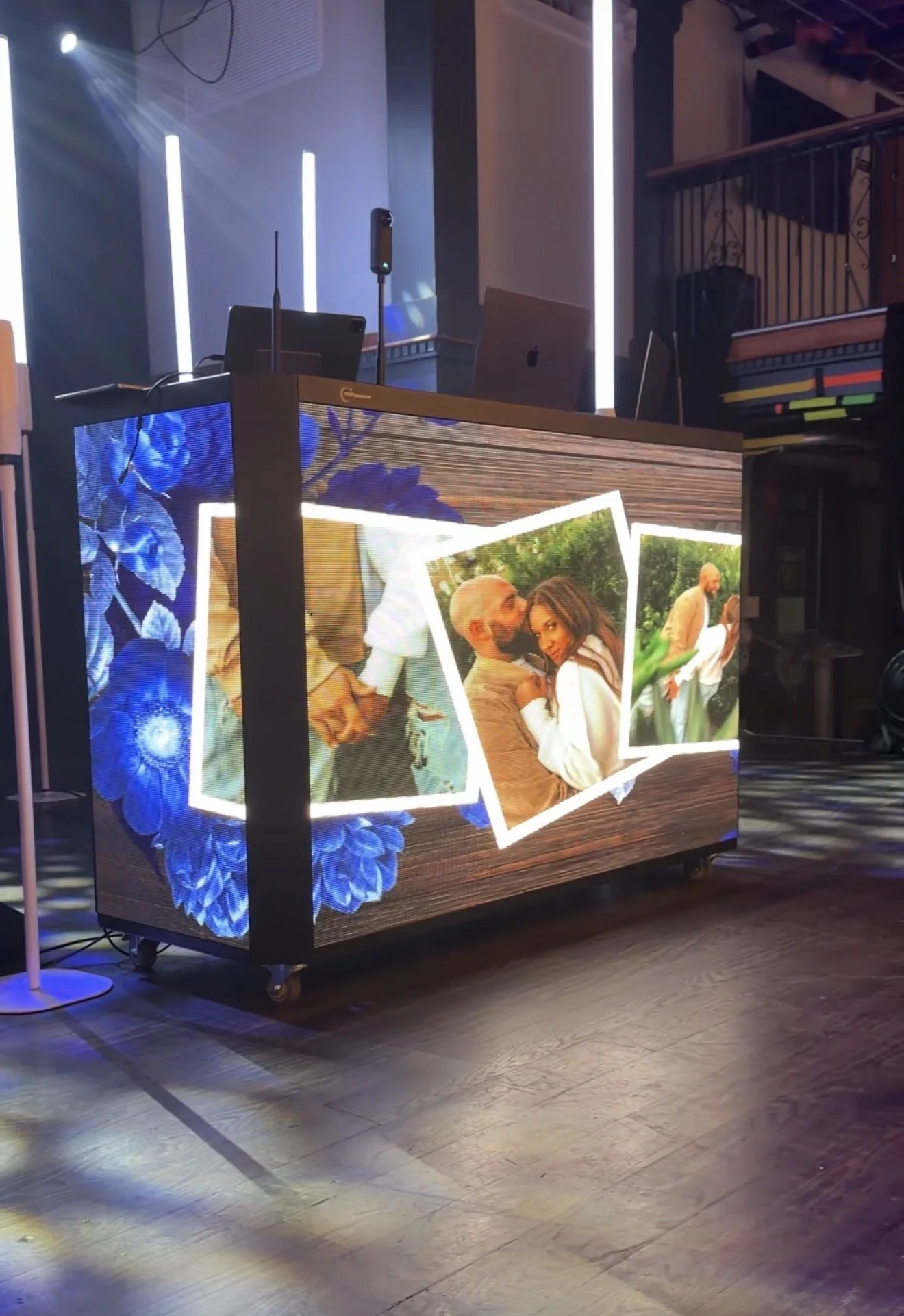 Custom LED DJ booth displaying a personalized wedding photo slideshow in Savannah Georgia
