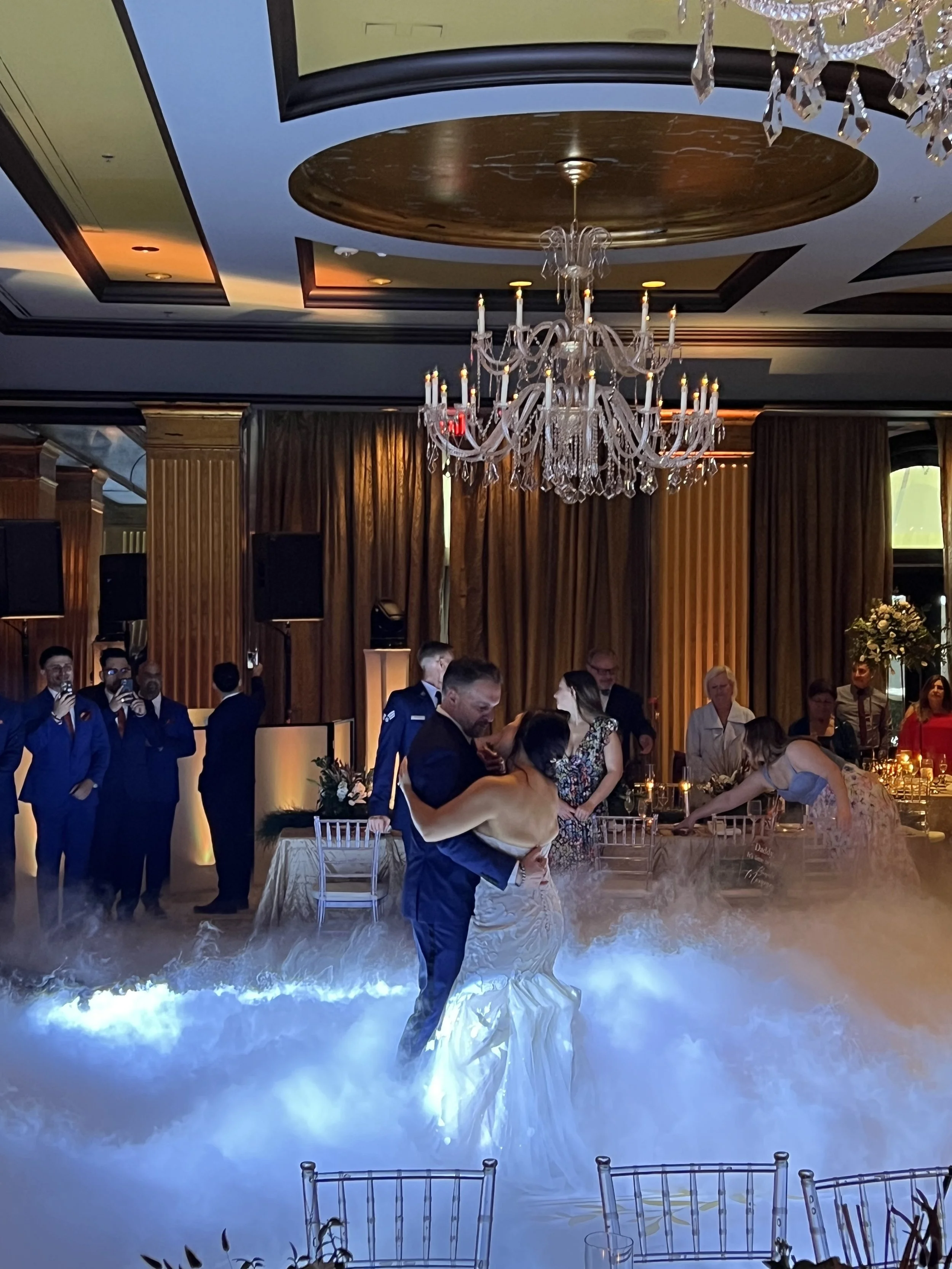 Bride and groom sharing their first dance with Dancing on the Cloud effect at a Savannah Georgia wedding