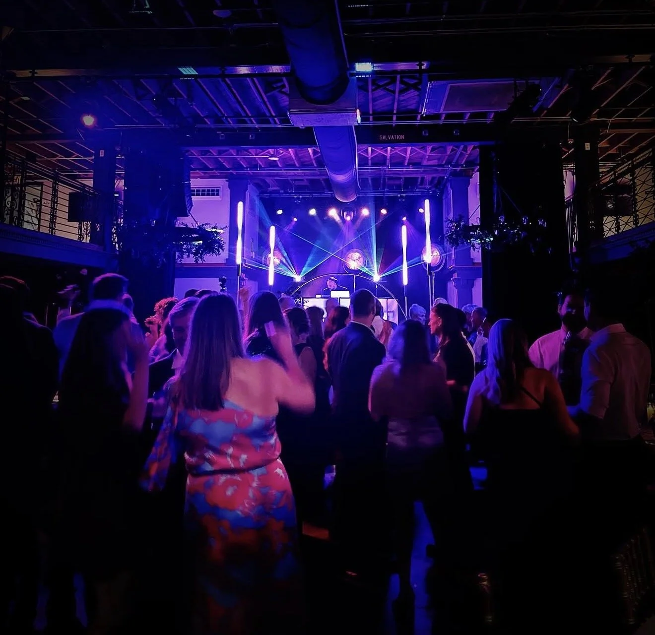 Luxury wedding DJ booth with intelligent lighting and immersive production
