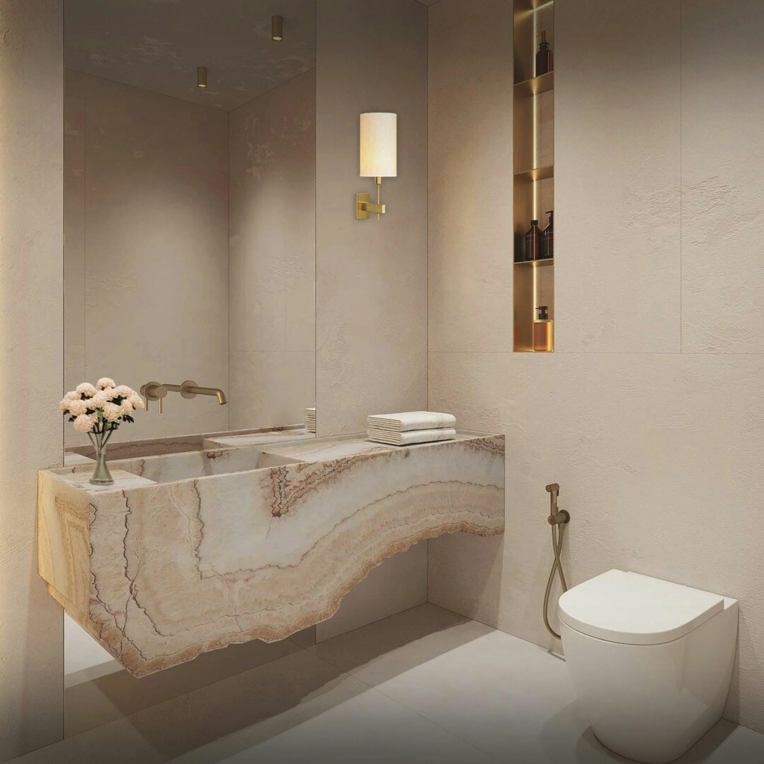 Luxury bathroom renovation with sculptural stone vanity