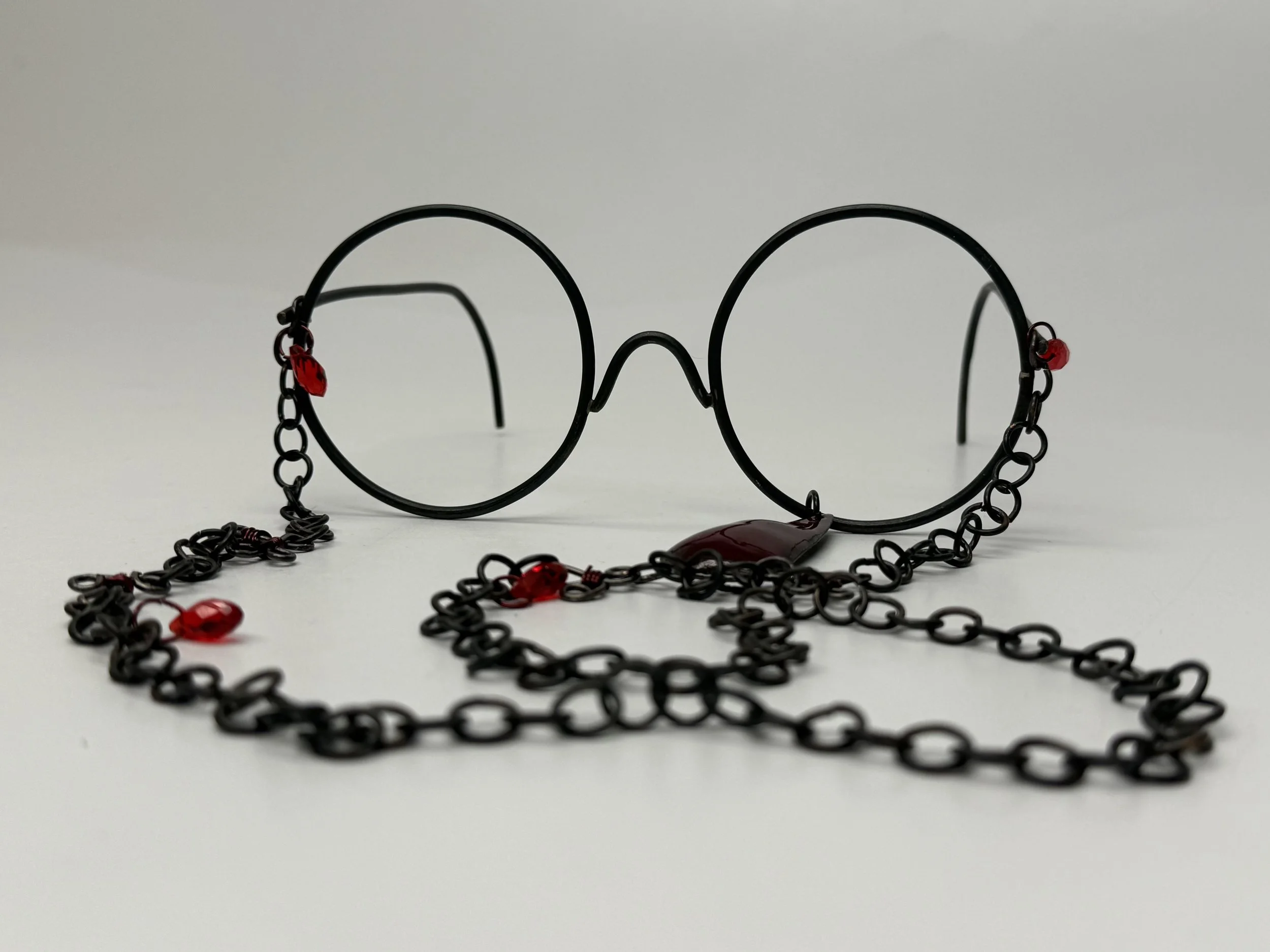 Mourning Glass, copper and glass beads, 2025