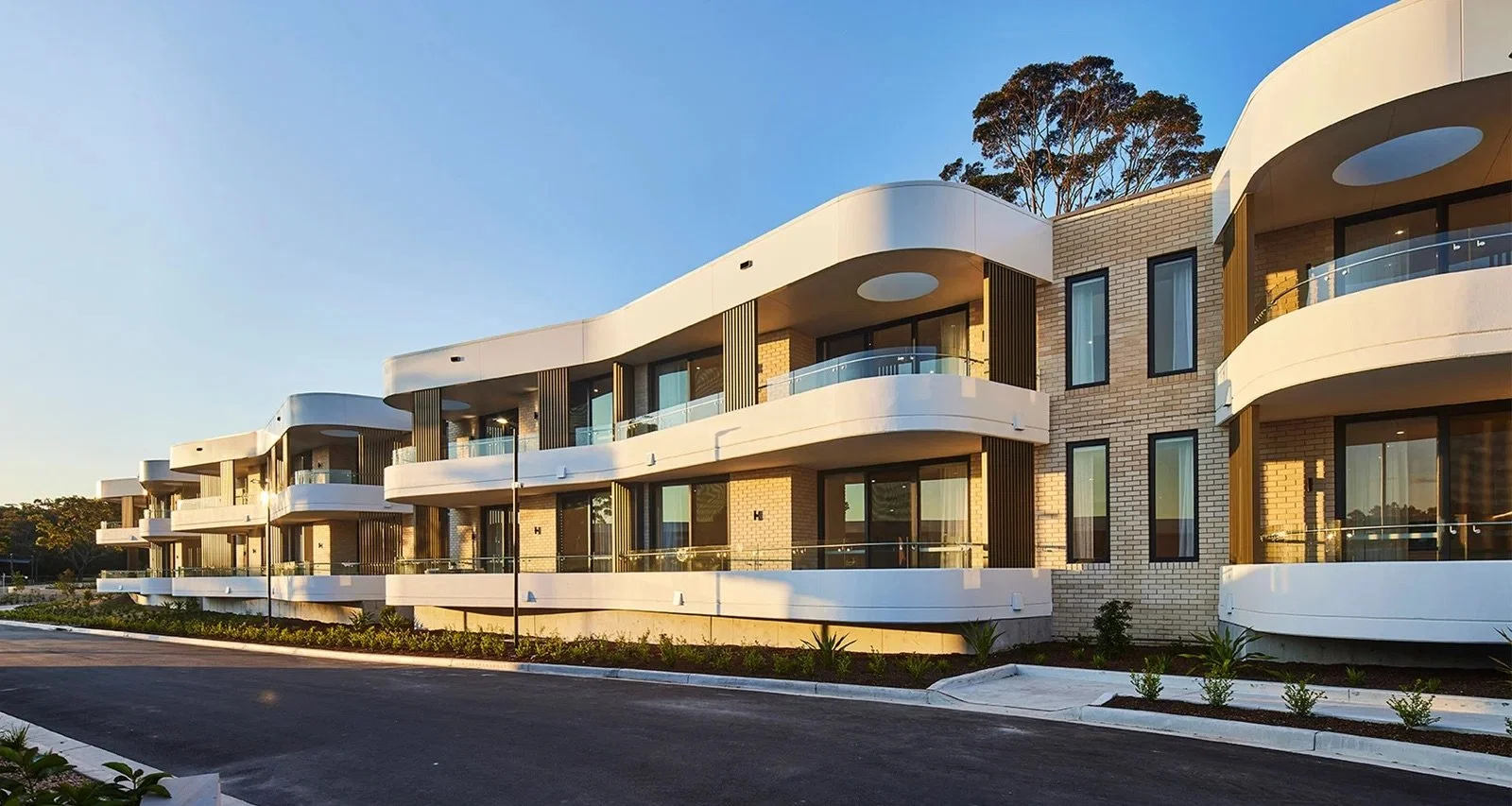 001-landscape-hero-image-sunset-street-view-sun-dappled-glass-bellburra-richard-crookes-constructions-retirement-living.jpeg