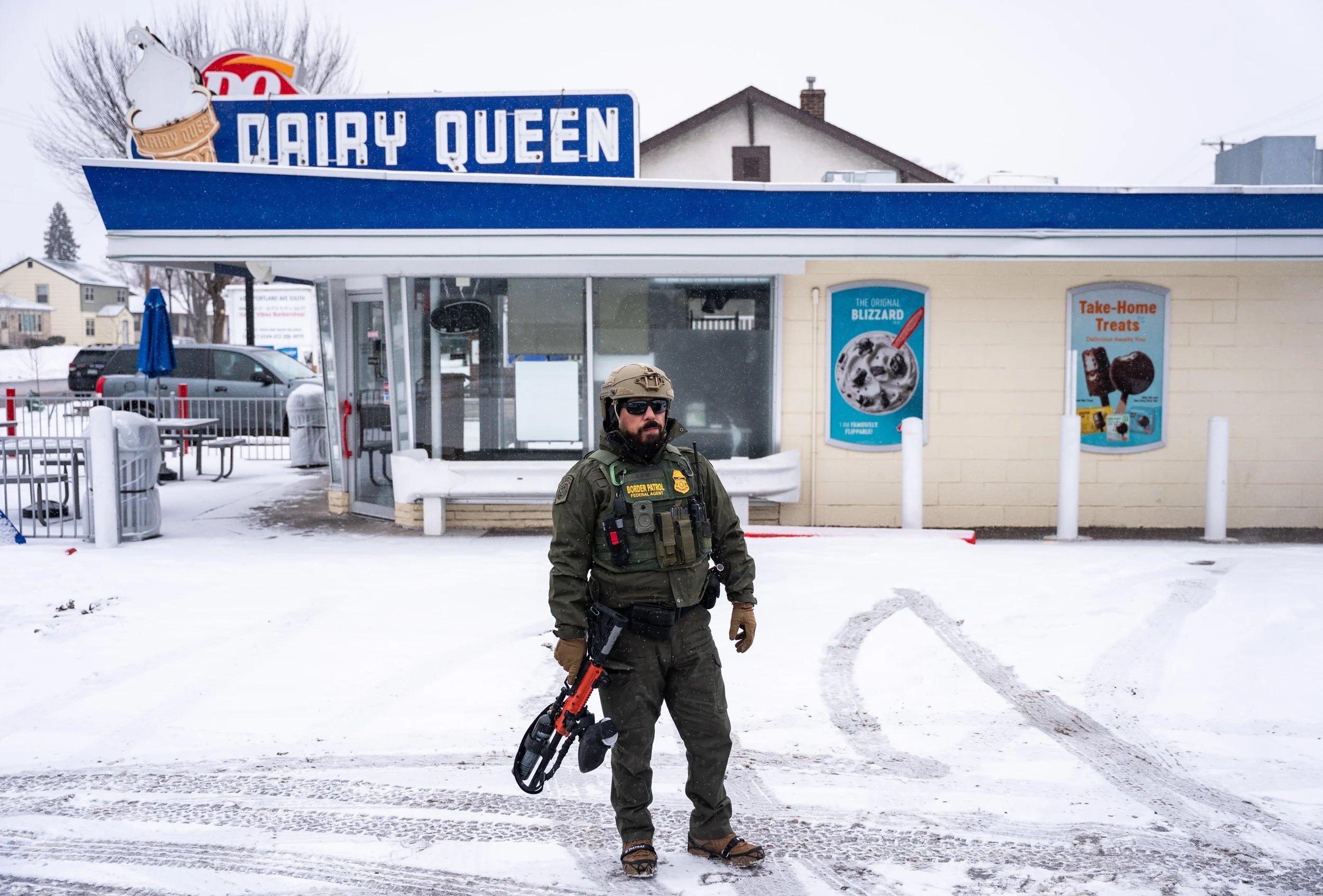  Border Patrol Assistant Chief David Kim stands in front of a Dairy Queen during a stop at a gas station, as immigration enforcement continues after a U.S. Immigration and Customs Enforcement (ICE) agent fatally shot Renee Nicole Good on January 7, i