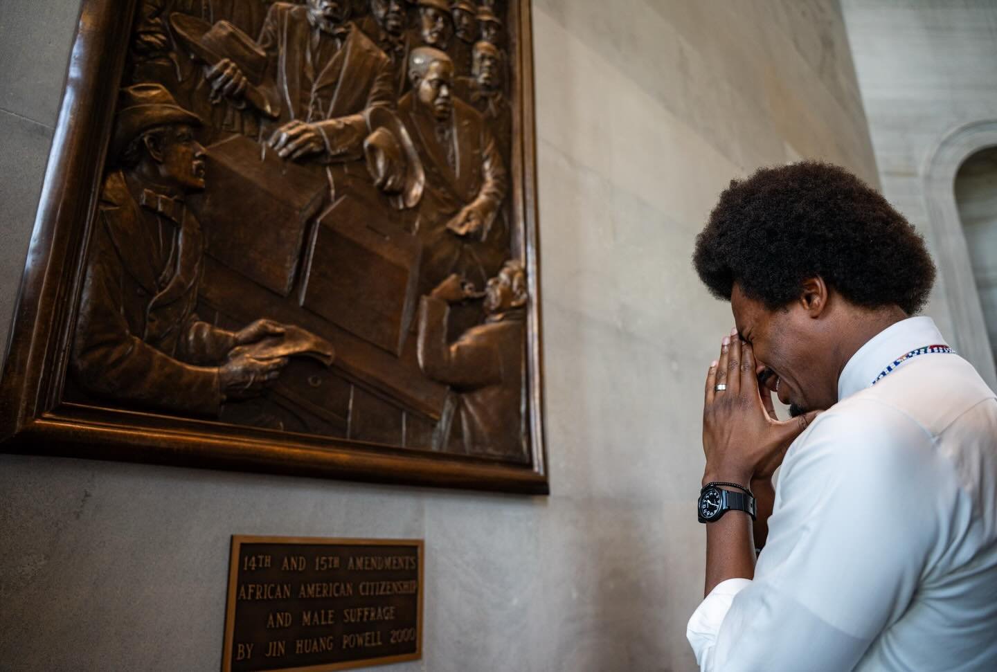 Democratic State House Rep. Justin J. Pearson of Memphis, weeps in front of the memorial to the 14th and 15th amendments African American citizenship and male suffrage in the Tennessee state capital building ahead of a special session where the state