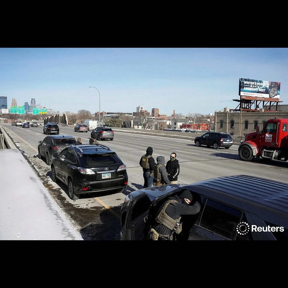 Federal immigration agents stand at Interstate 35W, while conducting immigration enforcement tasks in Minneapolis, Minnesota, U.S., February 3, 2026. ( Photo by @seth_herald for @reuters ) #minneapolis #immigration #unitedstatesofamerica #reutersphot