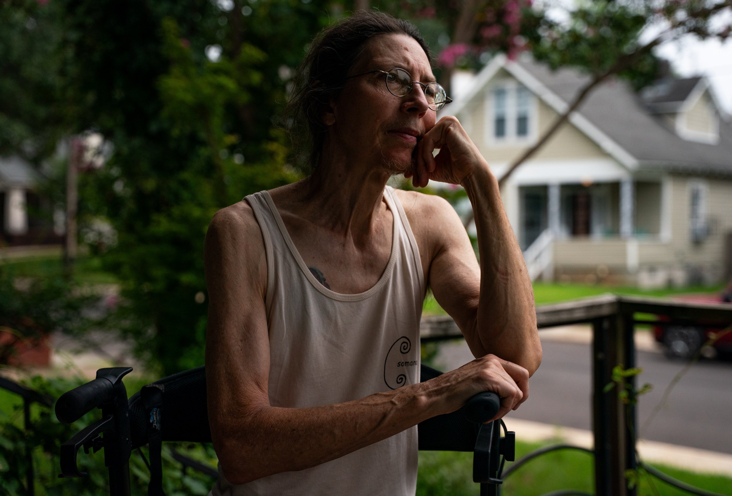  Tammy Jo O’Neal sits for a portrait on the front porch of their home which now falls in Congressional district five on Elzey Ave with their neighbors now being in Congressional District nine following the GOP led effort to redistrict Memphis, in Mem