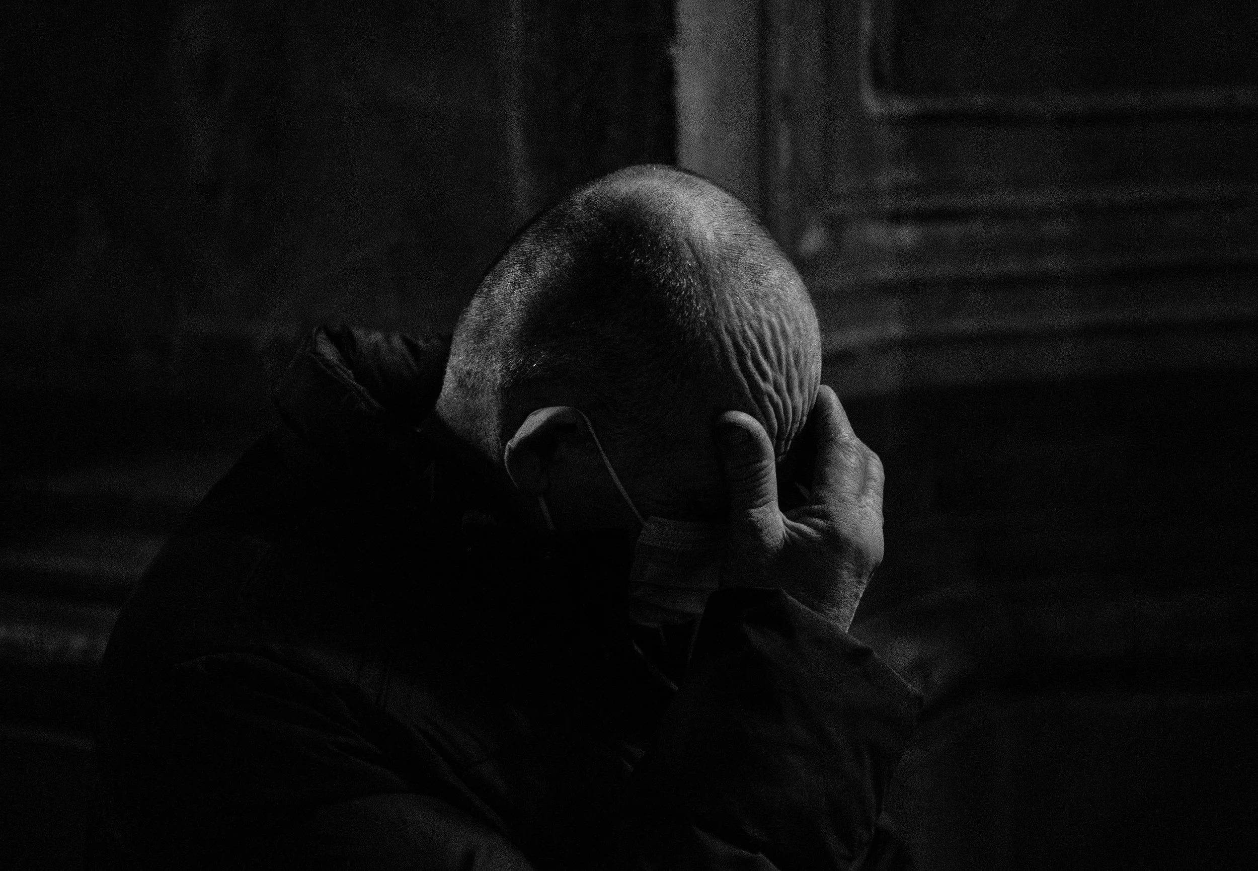  A man prays during mass on Sunday, March 13, 2022 at the Church of the Most Holy Apostles Peter and Paul. Earlier in the morning 35 people were killed and 135 injured after a Russian rocket attack on Yavoriv Military Training Base 25 km from the Pol