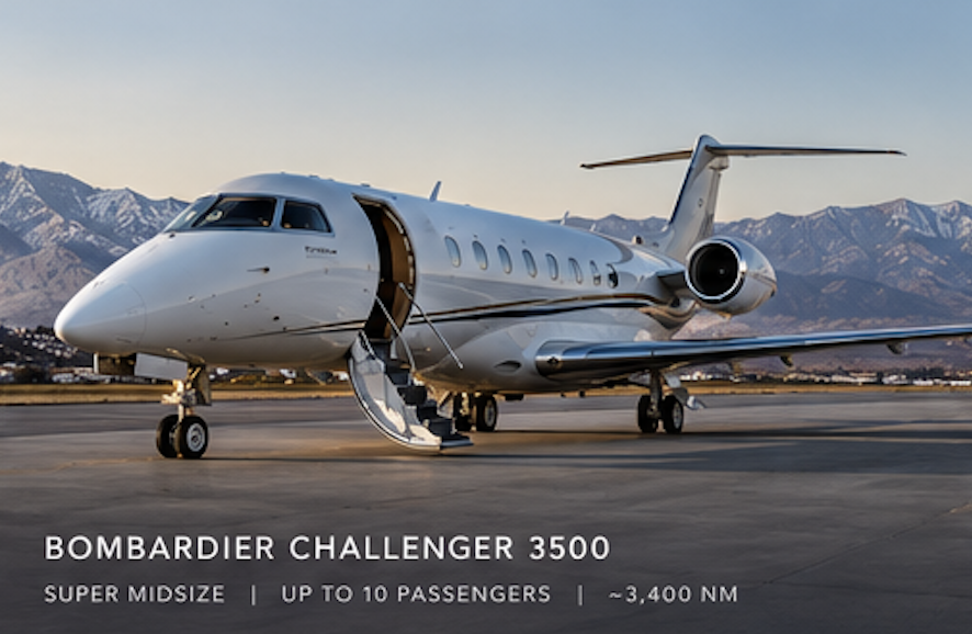 A Bombardier Challenger 3500 private jet on an airport tarmac with mountains in the background.