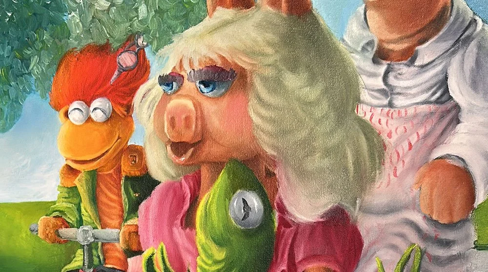 Dibujos de personajes de arena y de un niño, con colores vivos y estilo caricaturesco.