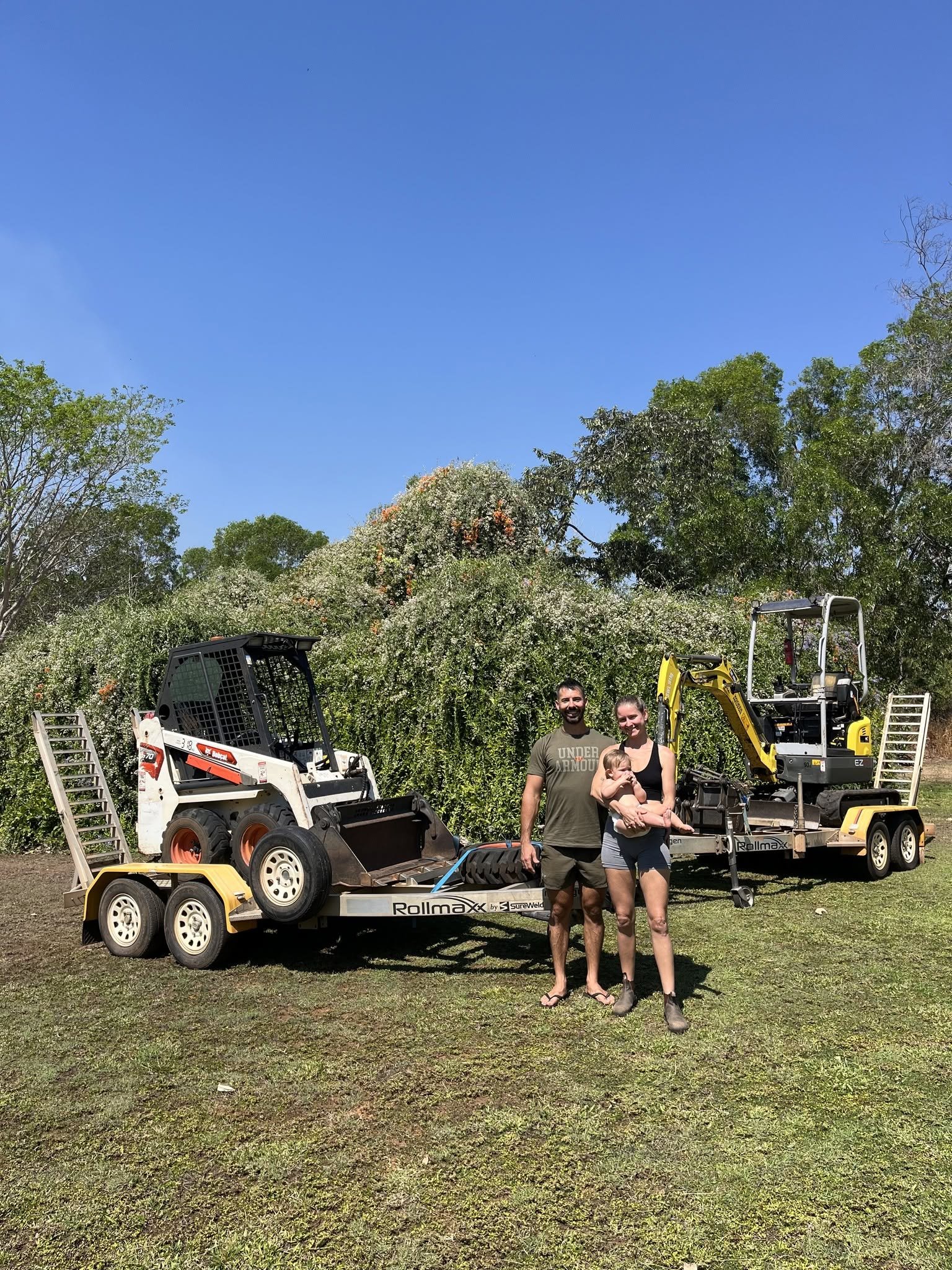 Ditch Digger Hire Owners Chris Farris and Siobhan pictured in front of the digger and excavator for hire in Howard Springs
