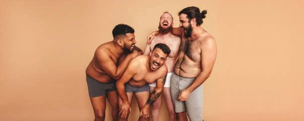 Three men laughing together, representing inclusive men's body waxing services.