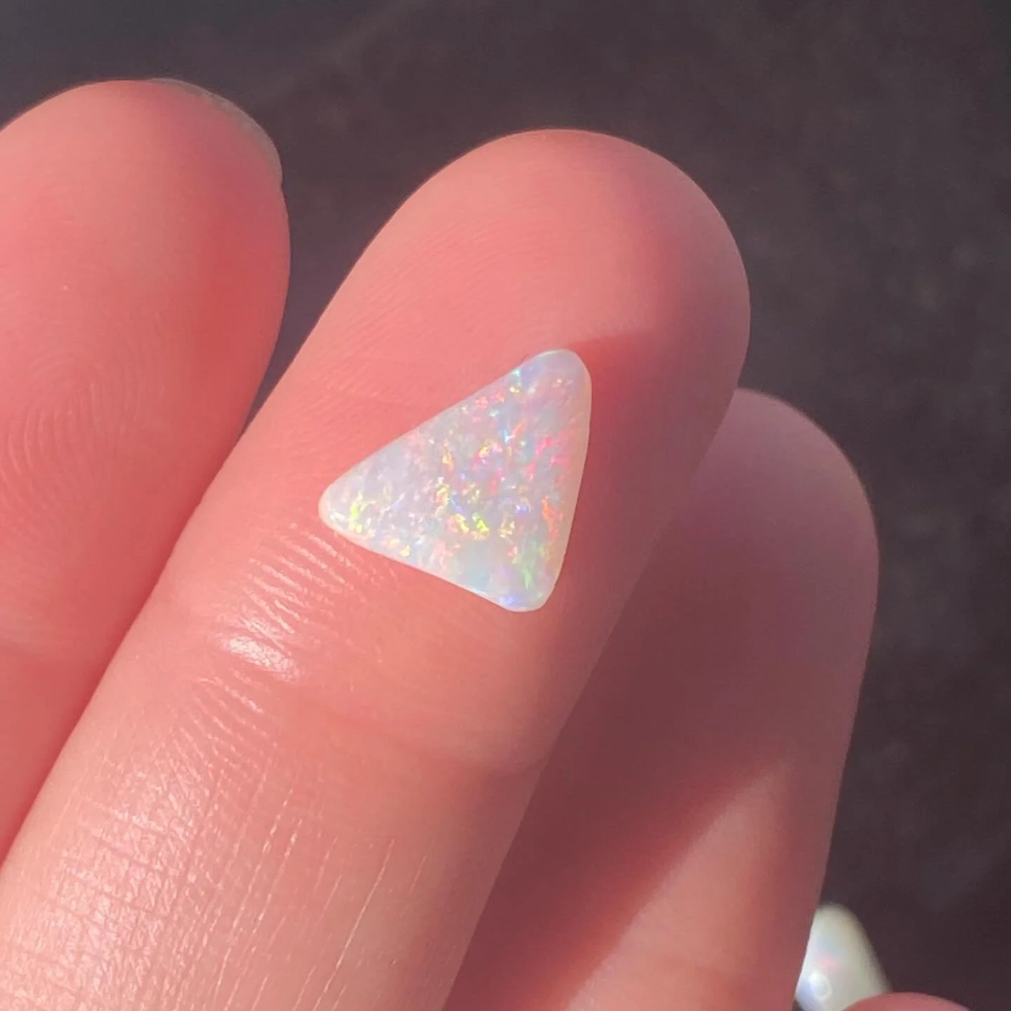 Solid opal on different background colours - watch how it changes depending on what colour is behind it. 
#opal #australianopal #solidopal