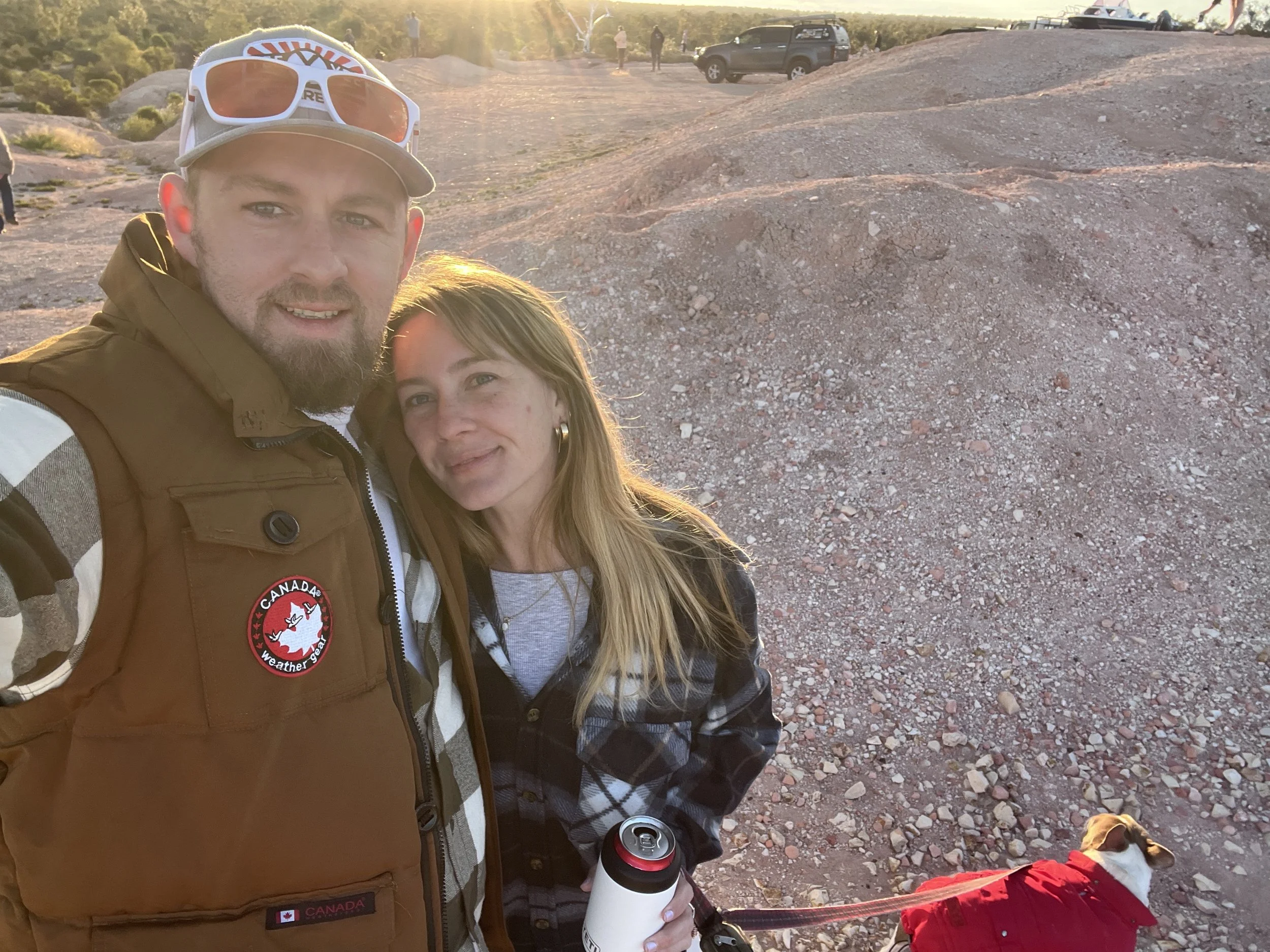 Maddy & Lee Cosgrove at the first shaft lookout in Lightning Ridge, NSW, Australia at sunset.
