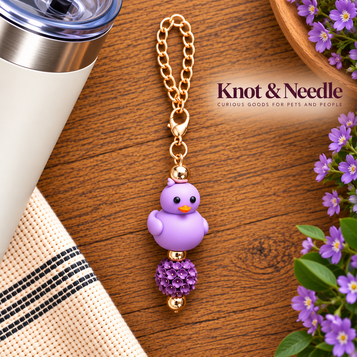 Purple Duck Floral Keychain Flat Lay.png