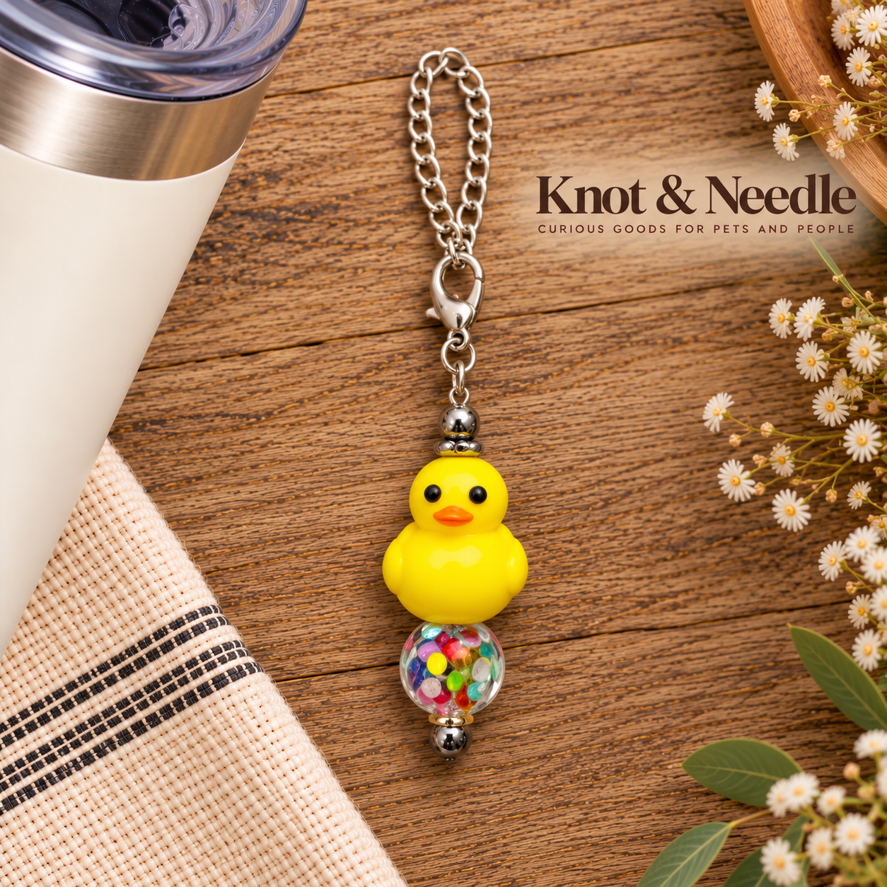 Knot & Needle Duck Charm.png