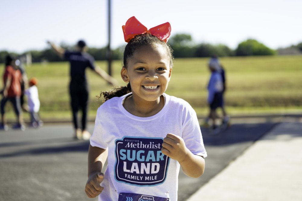 Young runner enjoying the Mile