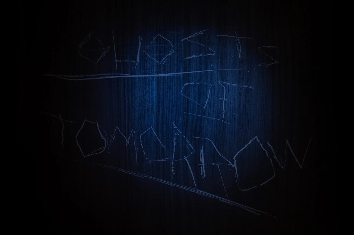 Title of "Ghosts of Tomorrow" carved with a knife into the entrance door of the Kinugawa Onsen installation at Gallery ETHER.