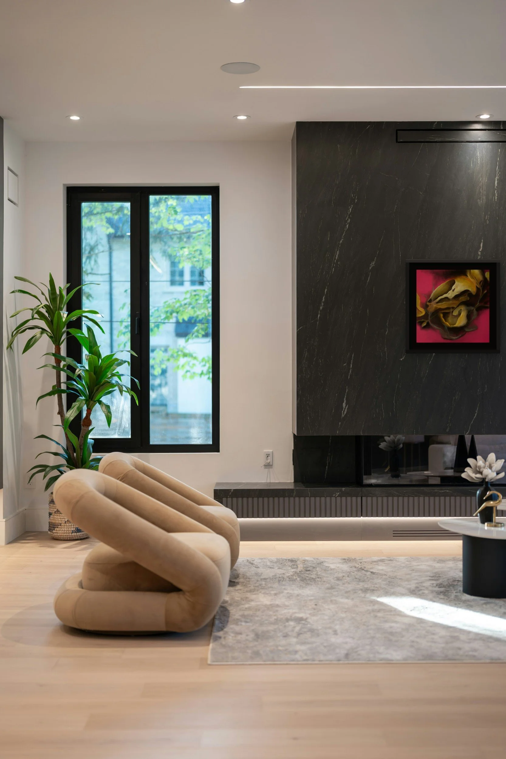 KamiMadArt_2026-006_Different-Kind-of-Bloom-1_MOCKUP_black-marble-fireplace.jpg