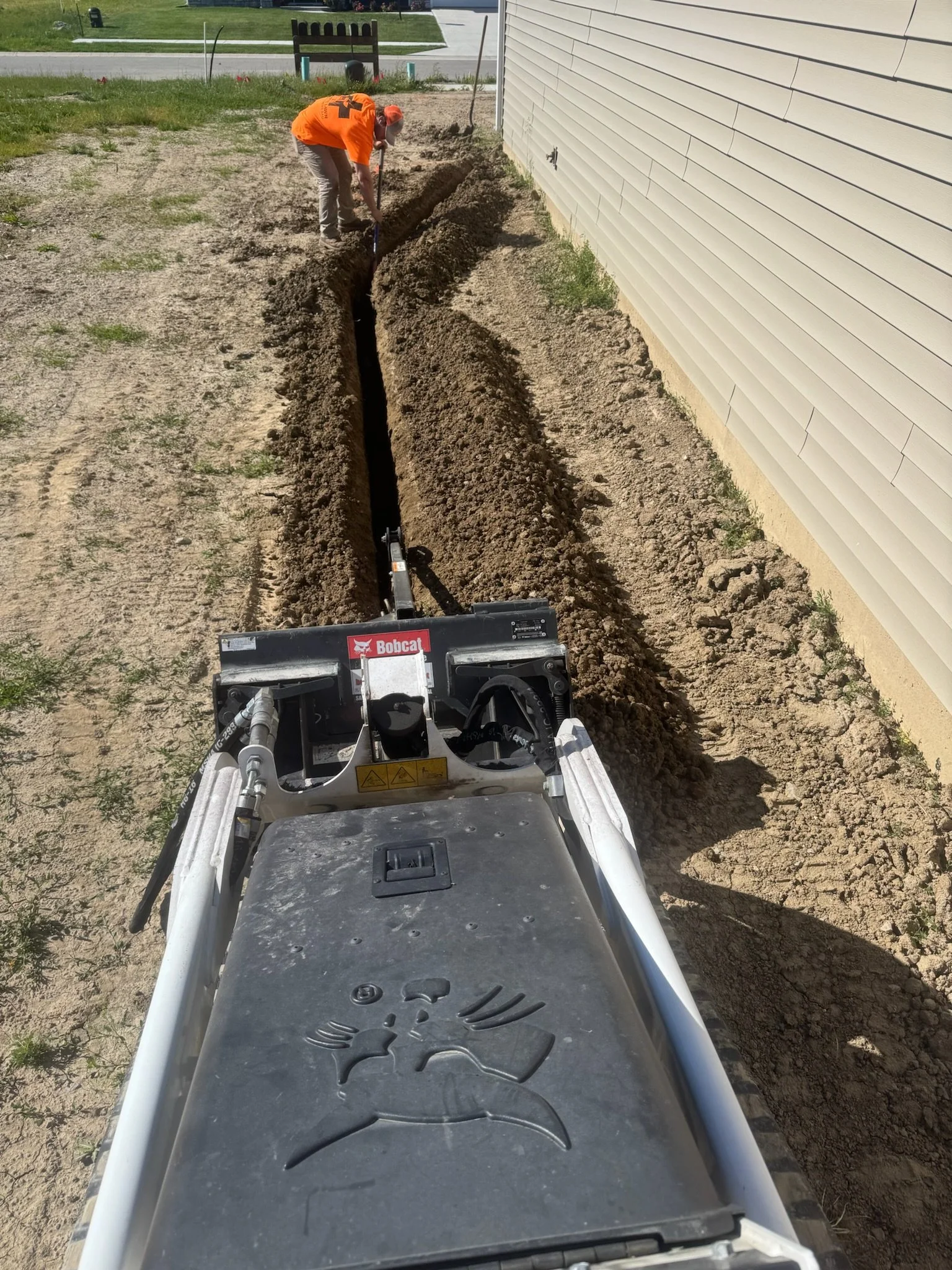 Downspout Trenching and Drain Tile