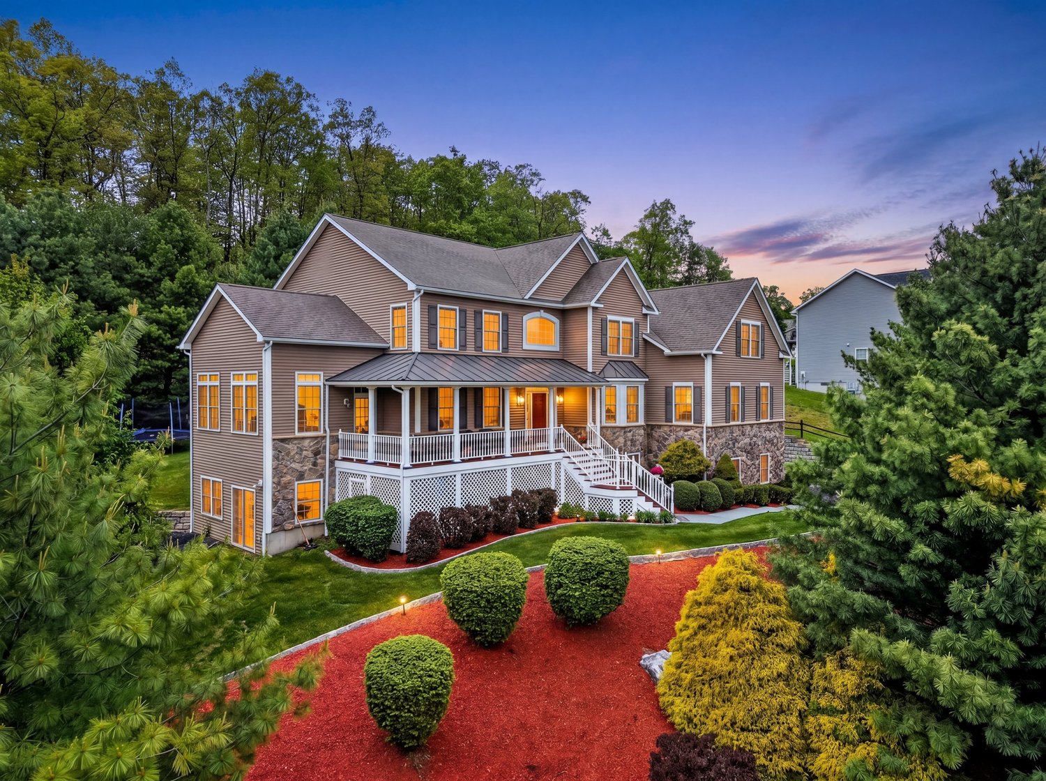 Twilight exterior of a home photographed by HomeTourVision