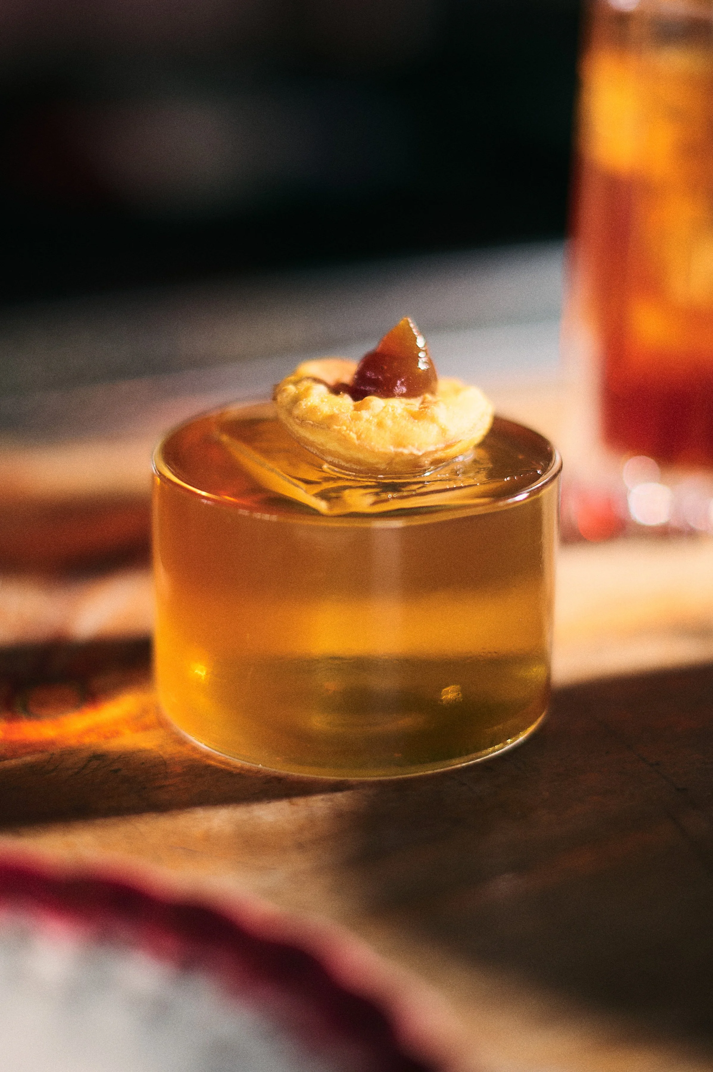 Mote con Huesillo en Bar La Providencia, cóctel cremoso inspirado en el postre tradicional chileno.