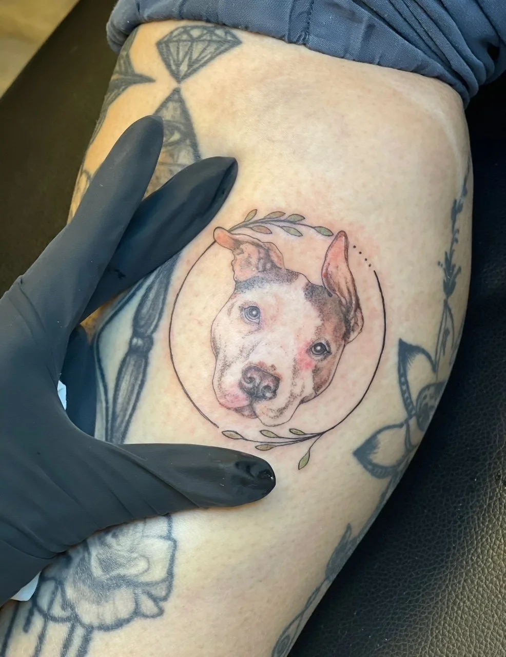 Pet Dog Portrait Tattoo by Kelly Cunningham at Handsome Devil Tattoo Company in Saddle Brook, New Jersey.