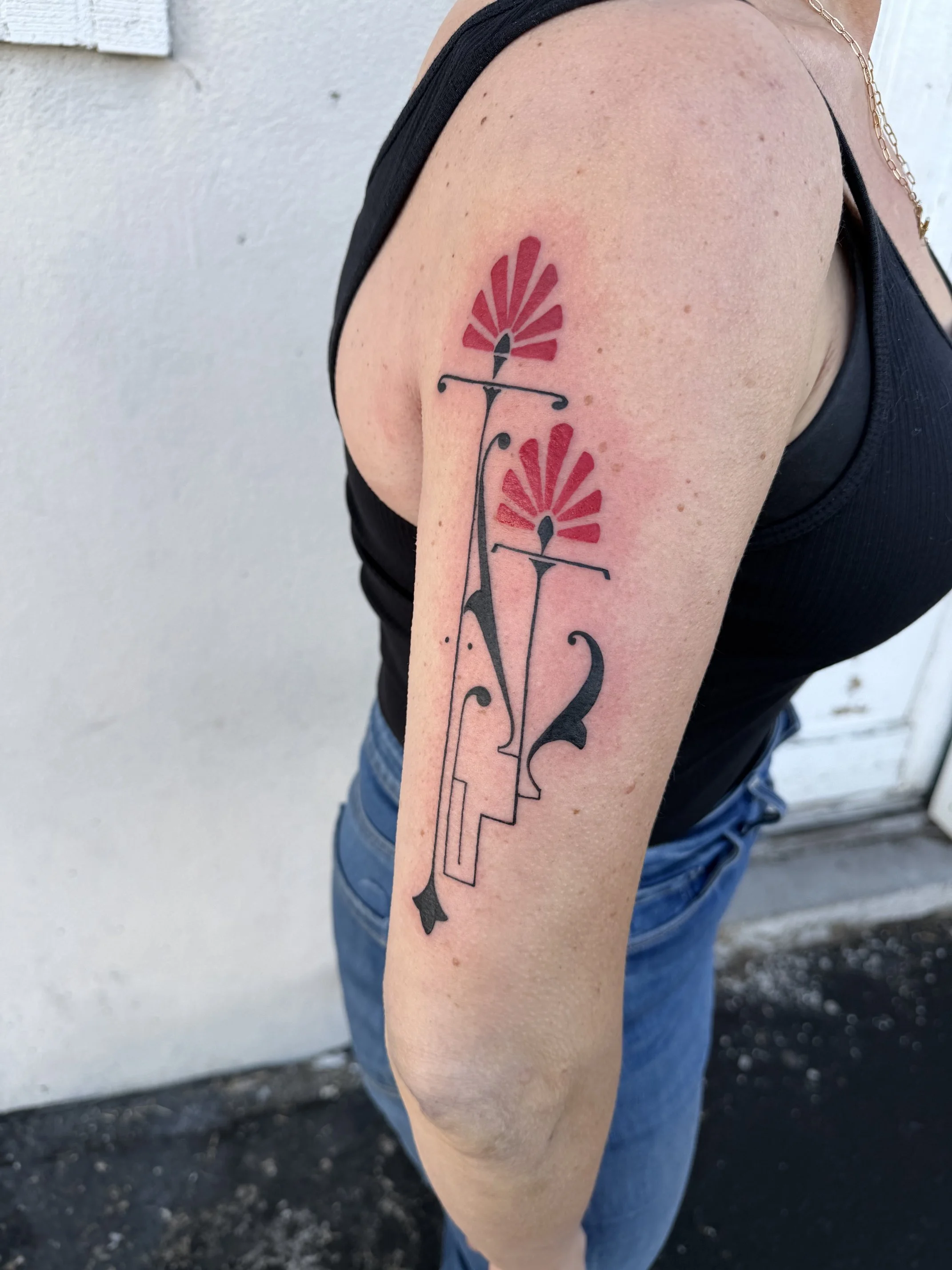 Abstract tattoo by Kelly Cunningham at Handsome Devil Tattoo Company in Saddle Brook, New Jersey.