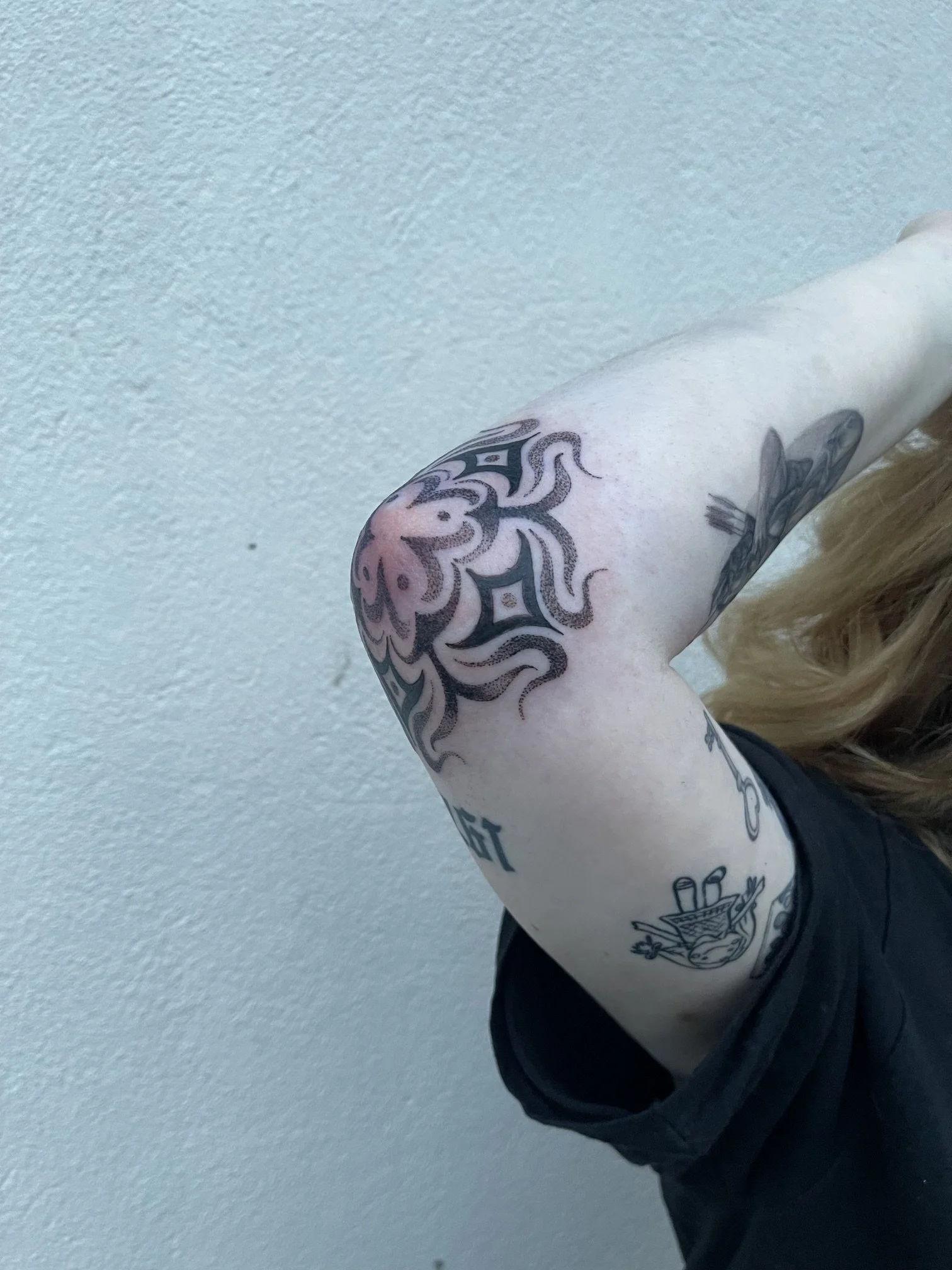 Sacred Geometry Elbow Tattoo by Kelly Cunningham at Handsome Devil Tattoo Company in Saddle Brook, New Jersey.