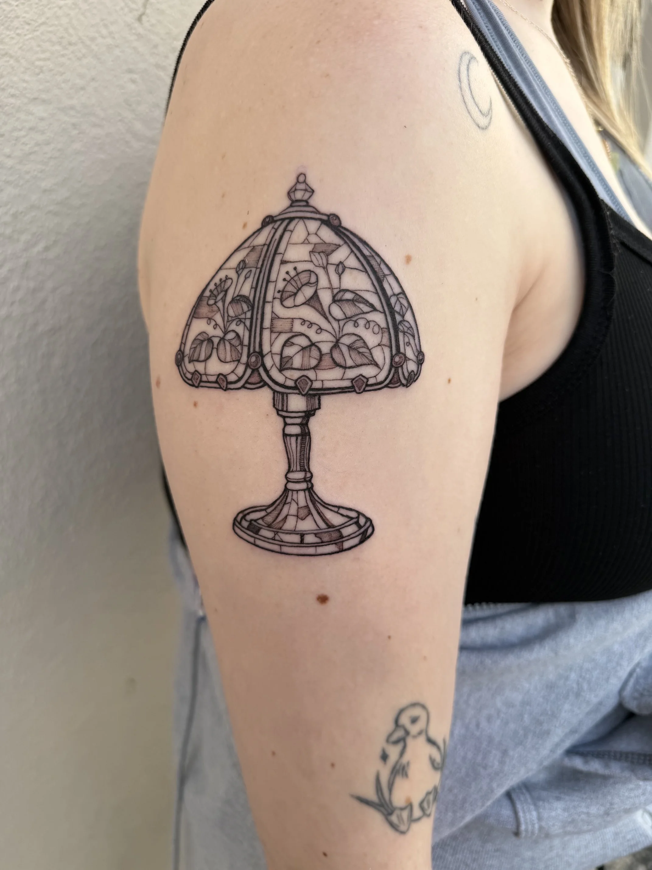 Geometric Lamp Tattoo by Kelly Cunningham at Handsome Devil Tattoo Company in Saddle Brook, New Jersey.