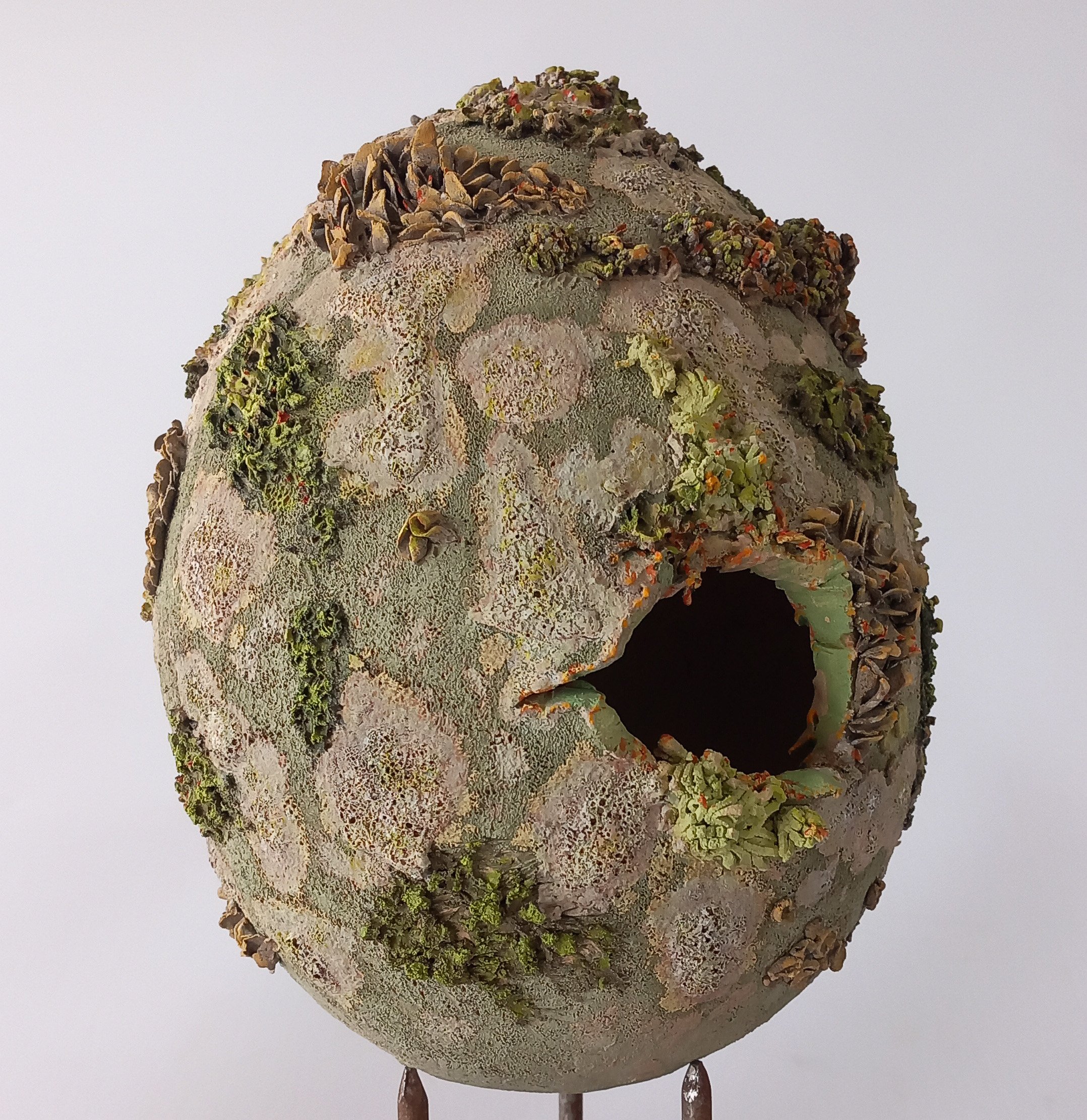 RECLAIMED, 2026, white stoneware with tinted slips, lava glaze, coloured under glazes, 13 x 16 x 13 cm